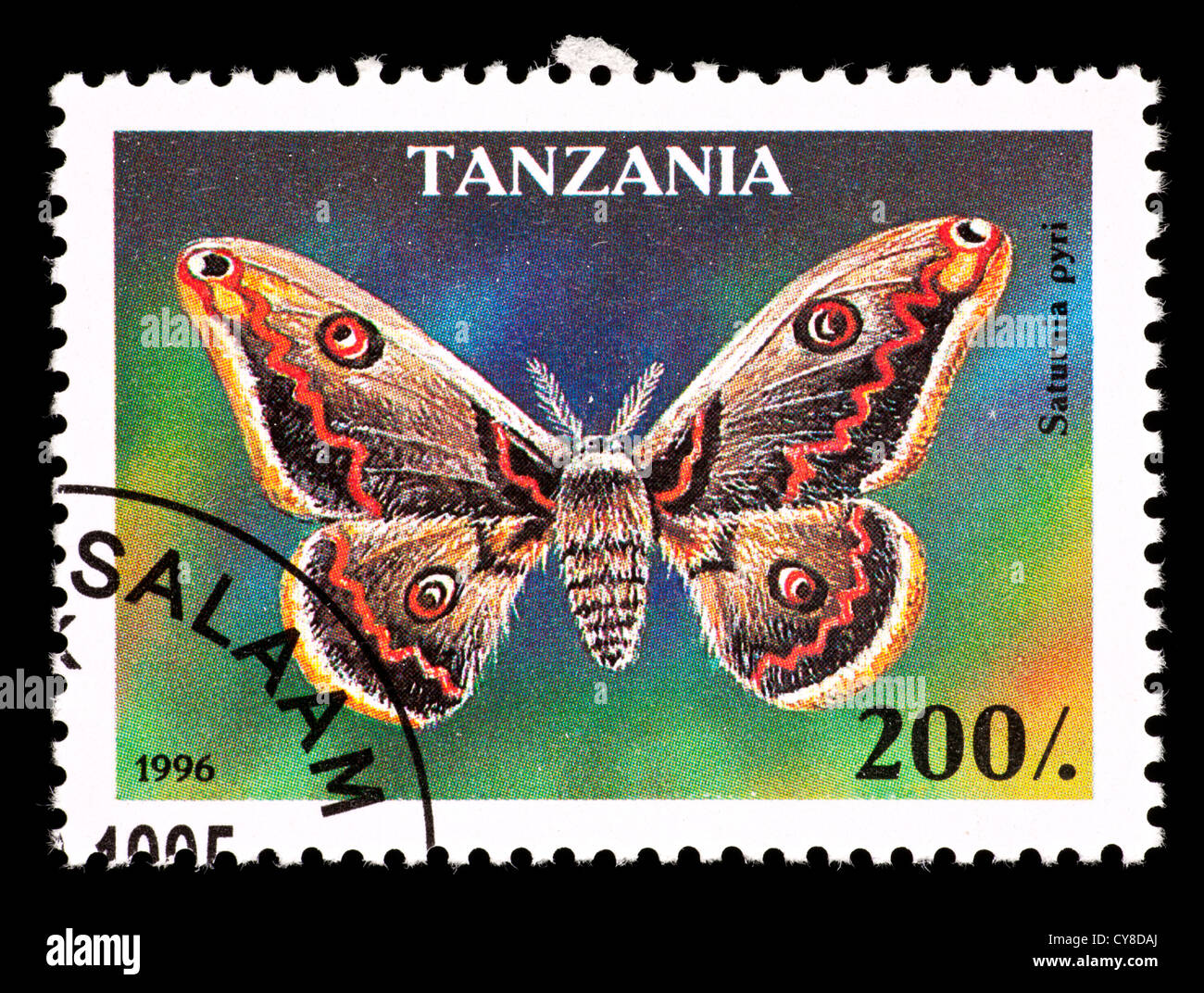 Postage stamp from Tanzania depicting a Giant Peacock Moth (Saturnia pyri) Stock Photo