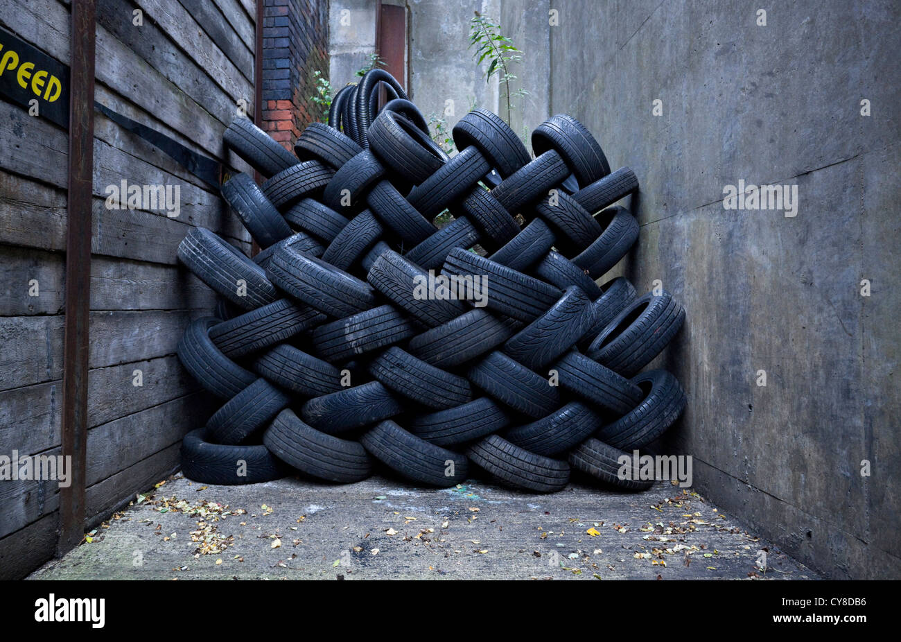 Used tyres stacked up. Stock Photo