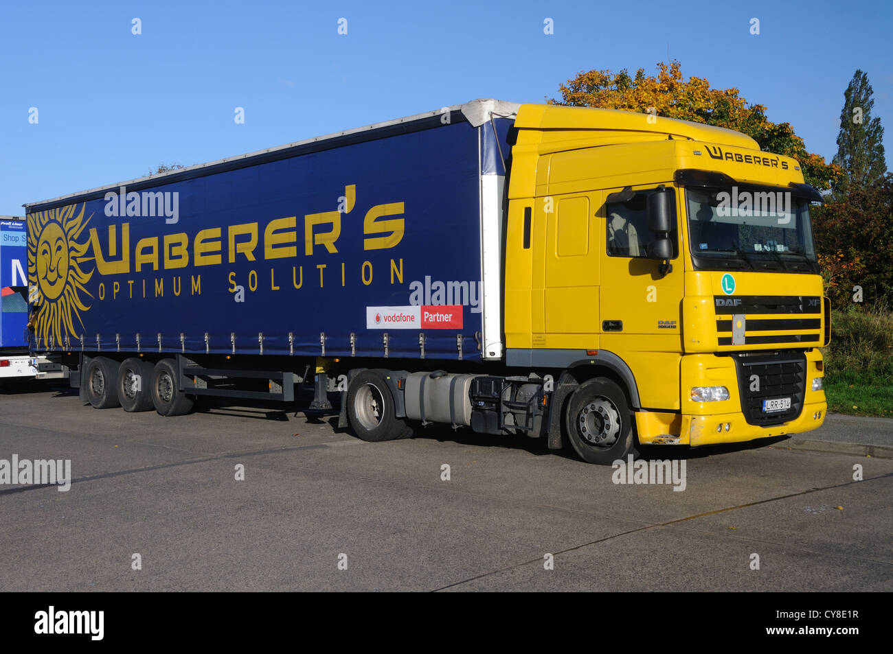 A DAF XF 105.410 tractor unit and trailer in the livery of Hungarian carrier Waberer's in Leicester, Leicestershire, England Stock Photo
