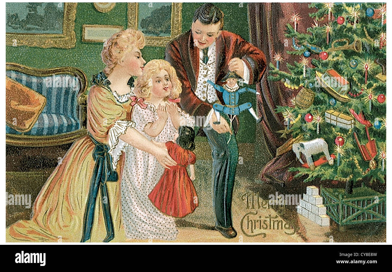 Family on a Christmas tree Stock Photo