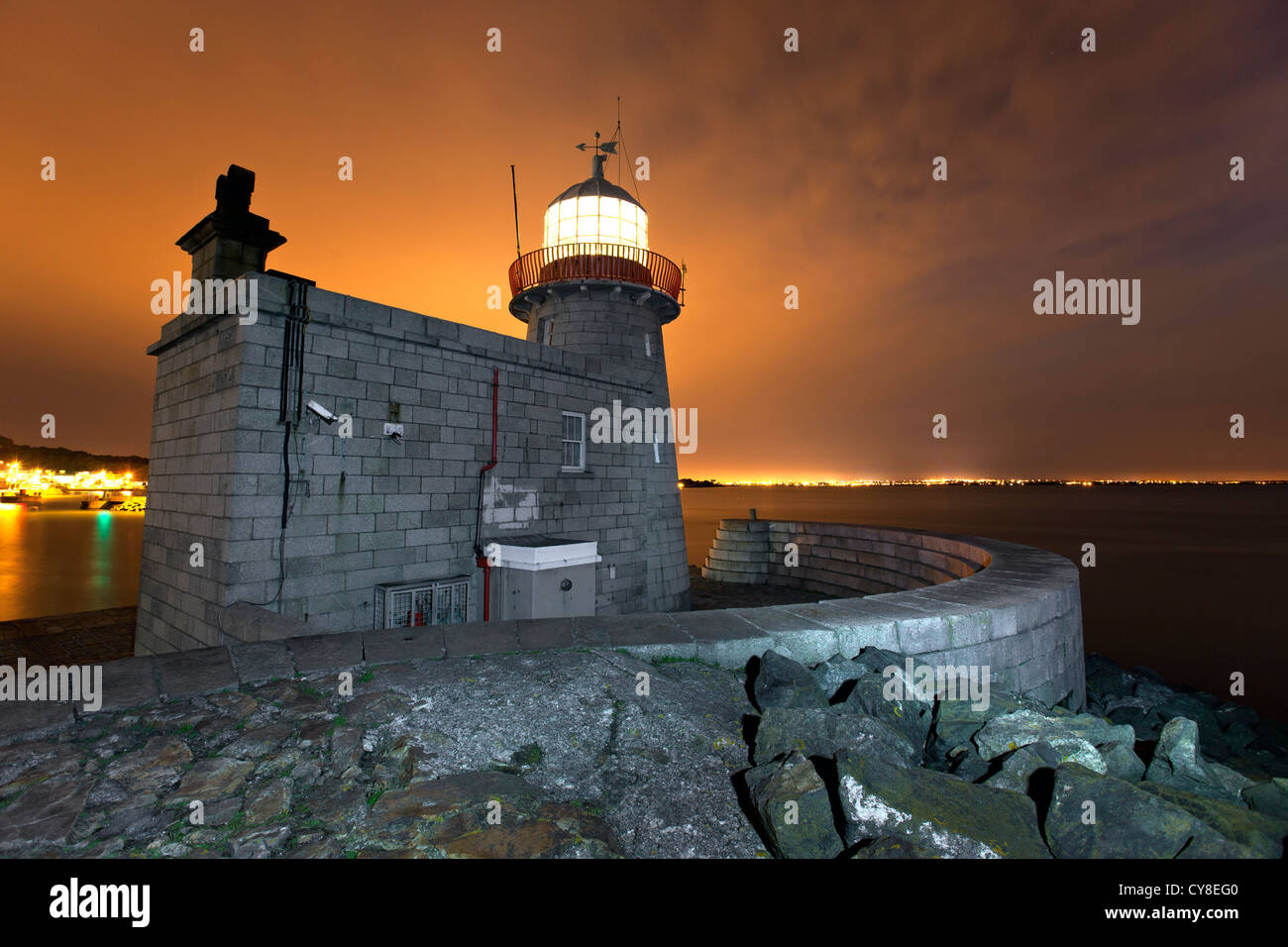 Howth Harbour lighthouse on the end of the southern arm of Dublin harbour. Stock Photo