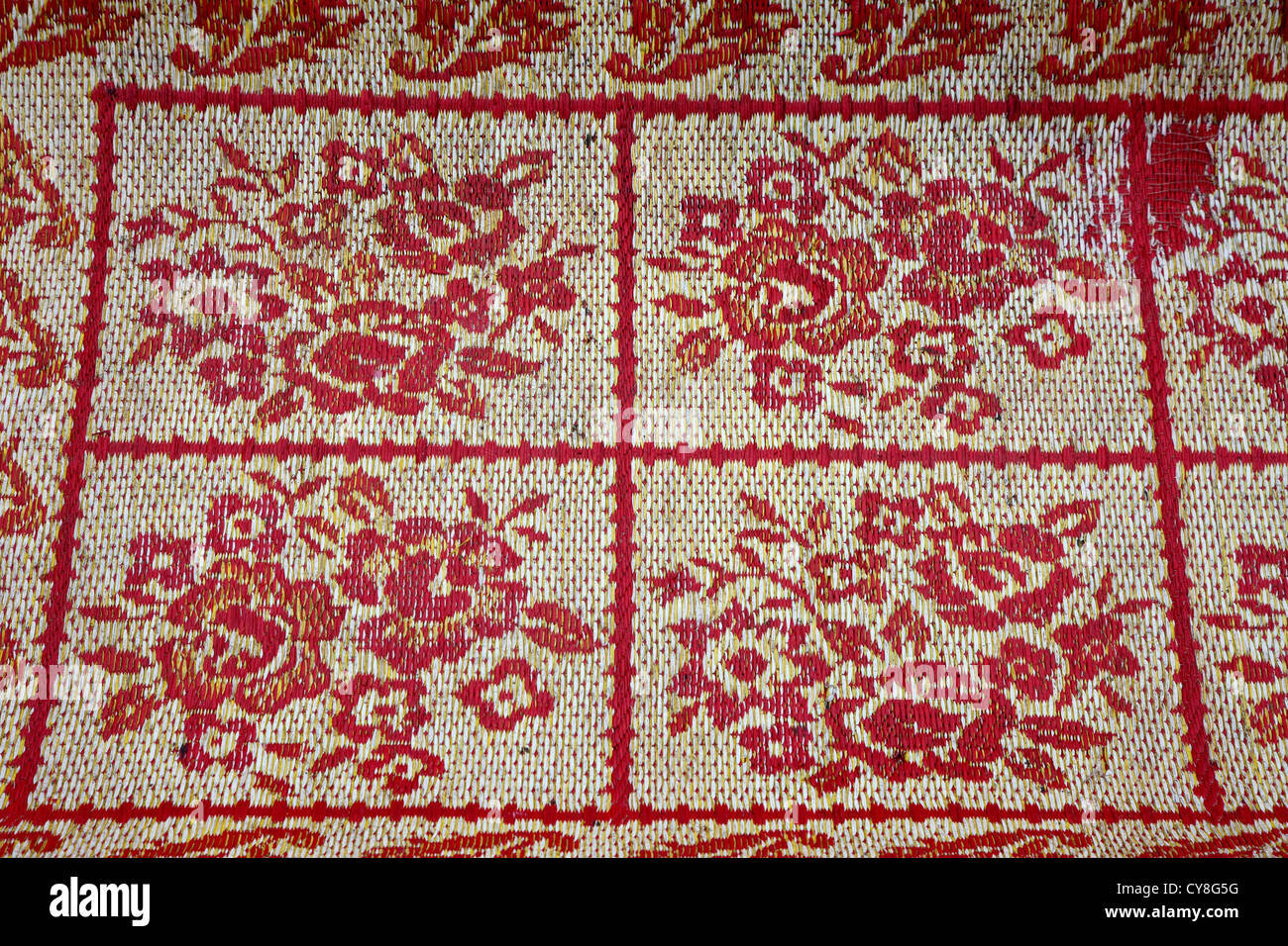 Myanmar, Burma. Flower Design on Woven Burmese Mat, Alodaw Pauk Pagoda, Nampan Village, Inle Lake, Shan State. Stock Photo