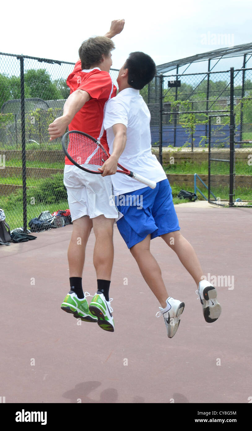 teenage boys doing a chest bump Stock Photo Alamy