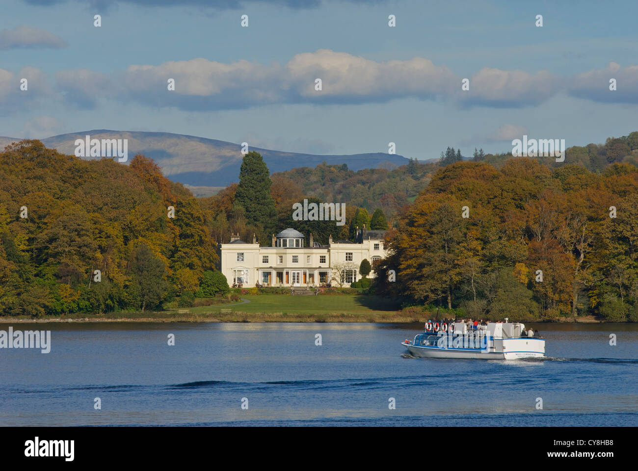 Passenger boat belong to Windermere Lake Cruises passing Storrs Hall