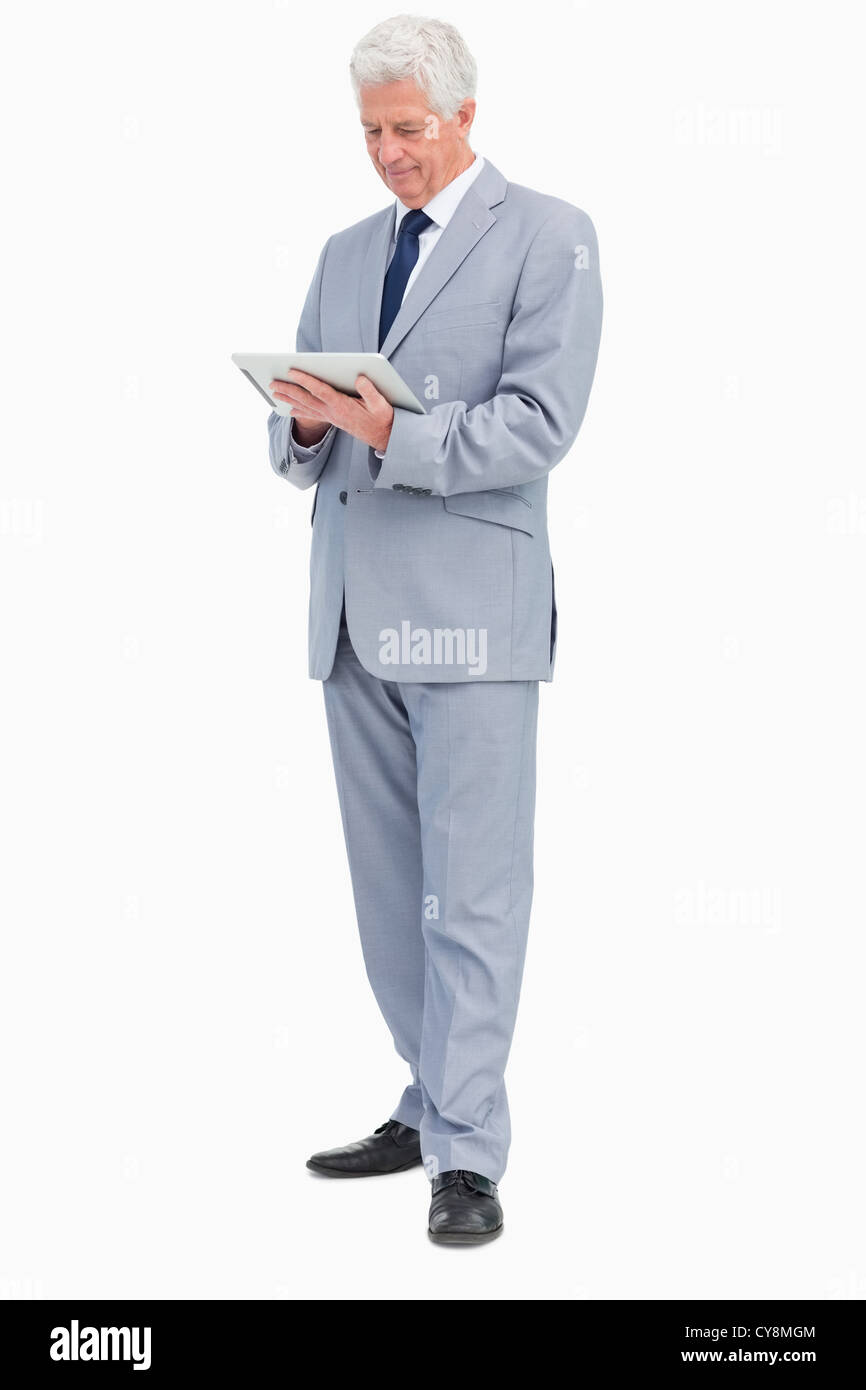 Businessman using a touch pad Stock Photo - Alamy