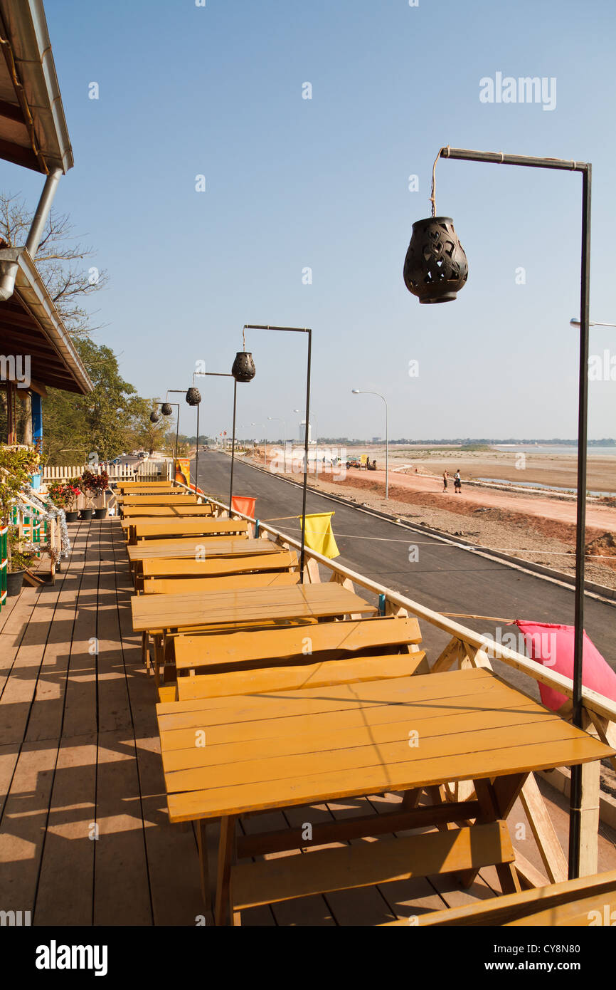 Restaurant at the River Mekong during the dry Season in Vientiane, Laos Stock Photo