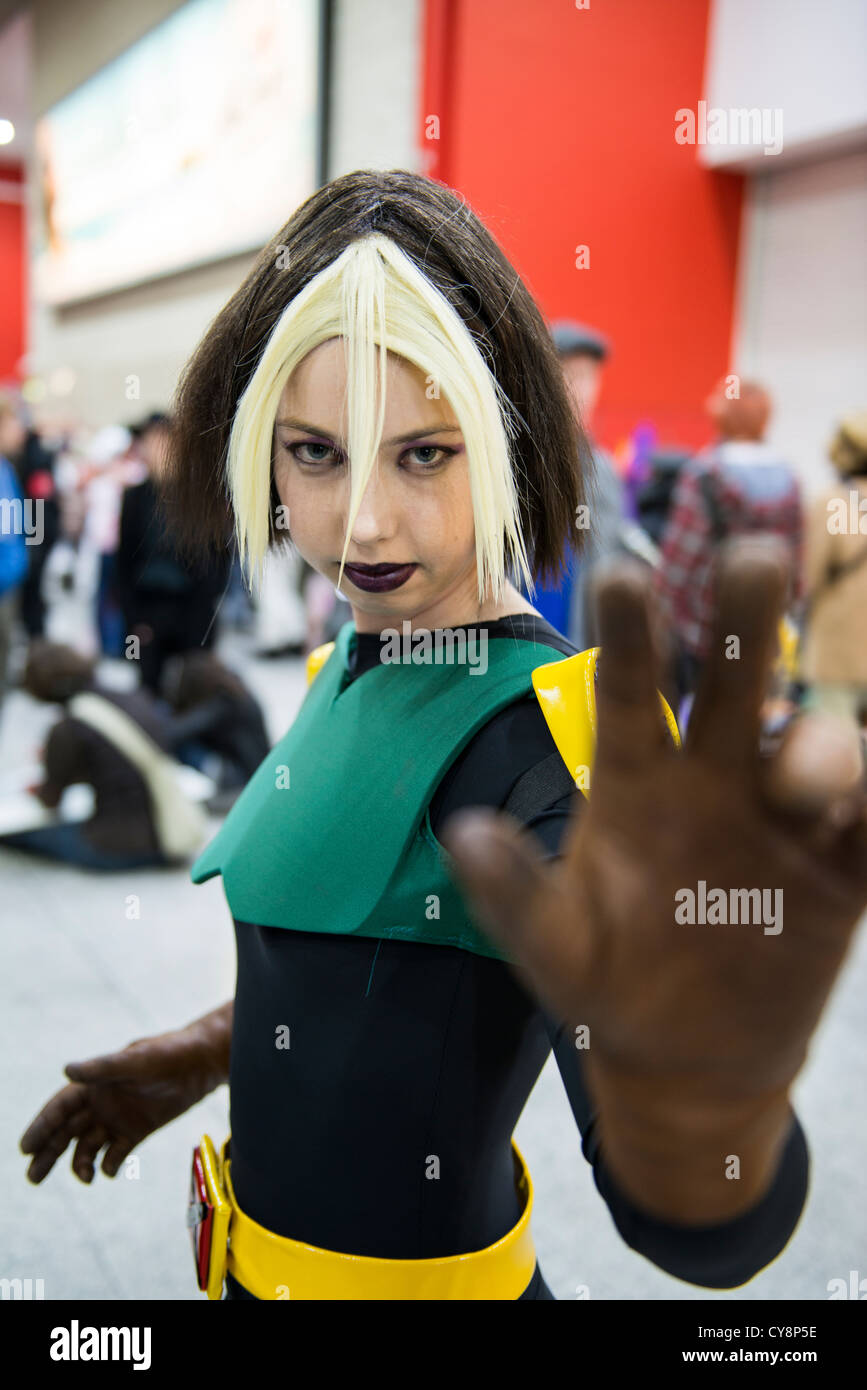 LONDON, UK - OCTOBER 27: Cosplayer impersonating super heroine Rogue poses for photographers at the London Comicon MCM Expo. Stock Photo