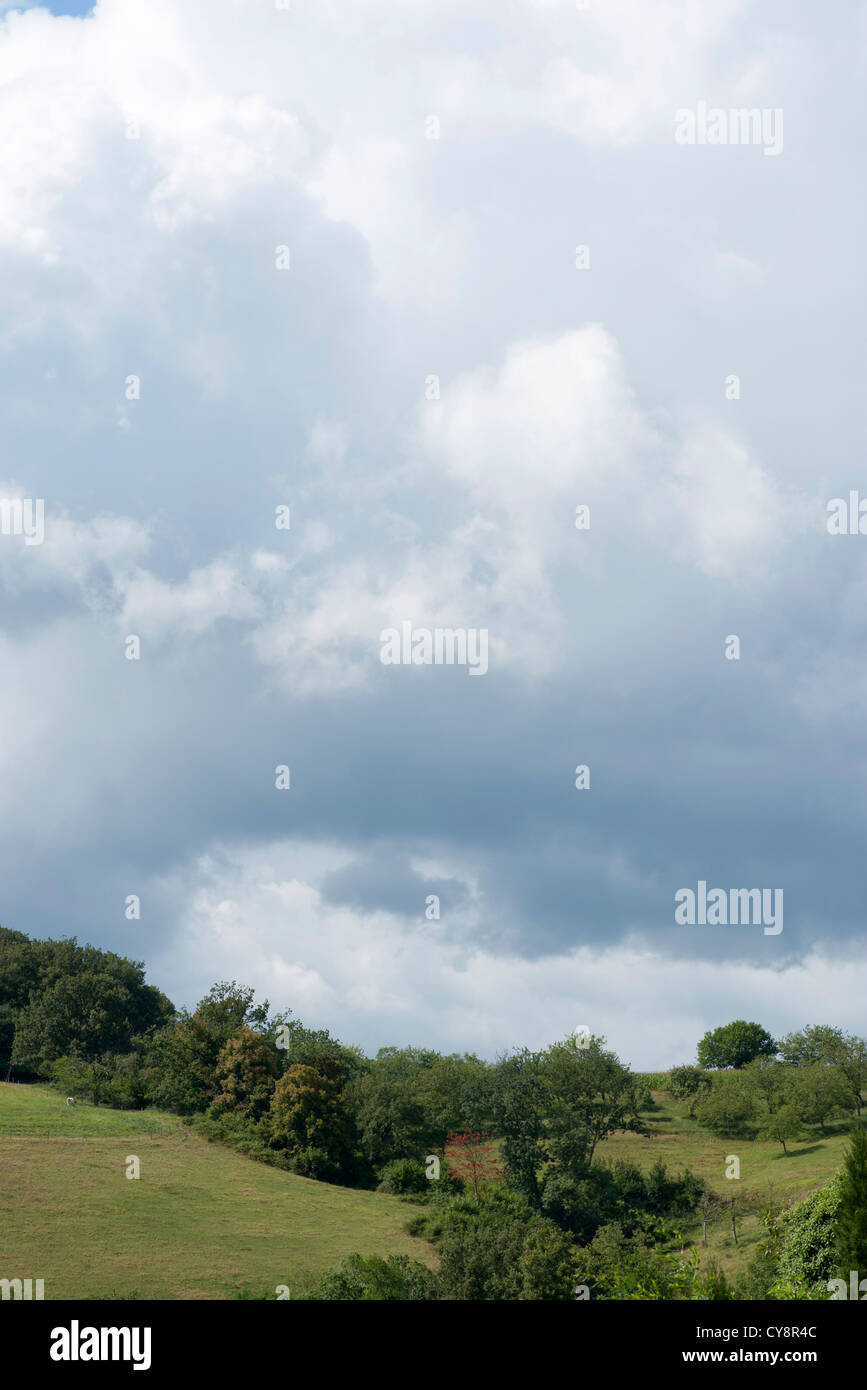 Storm clouds over countryside Stock Photo