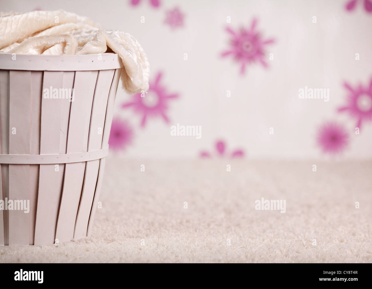 The wicker basket in pink room Stock Photo Alamy