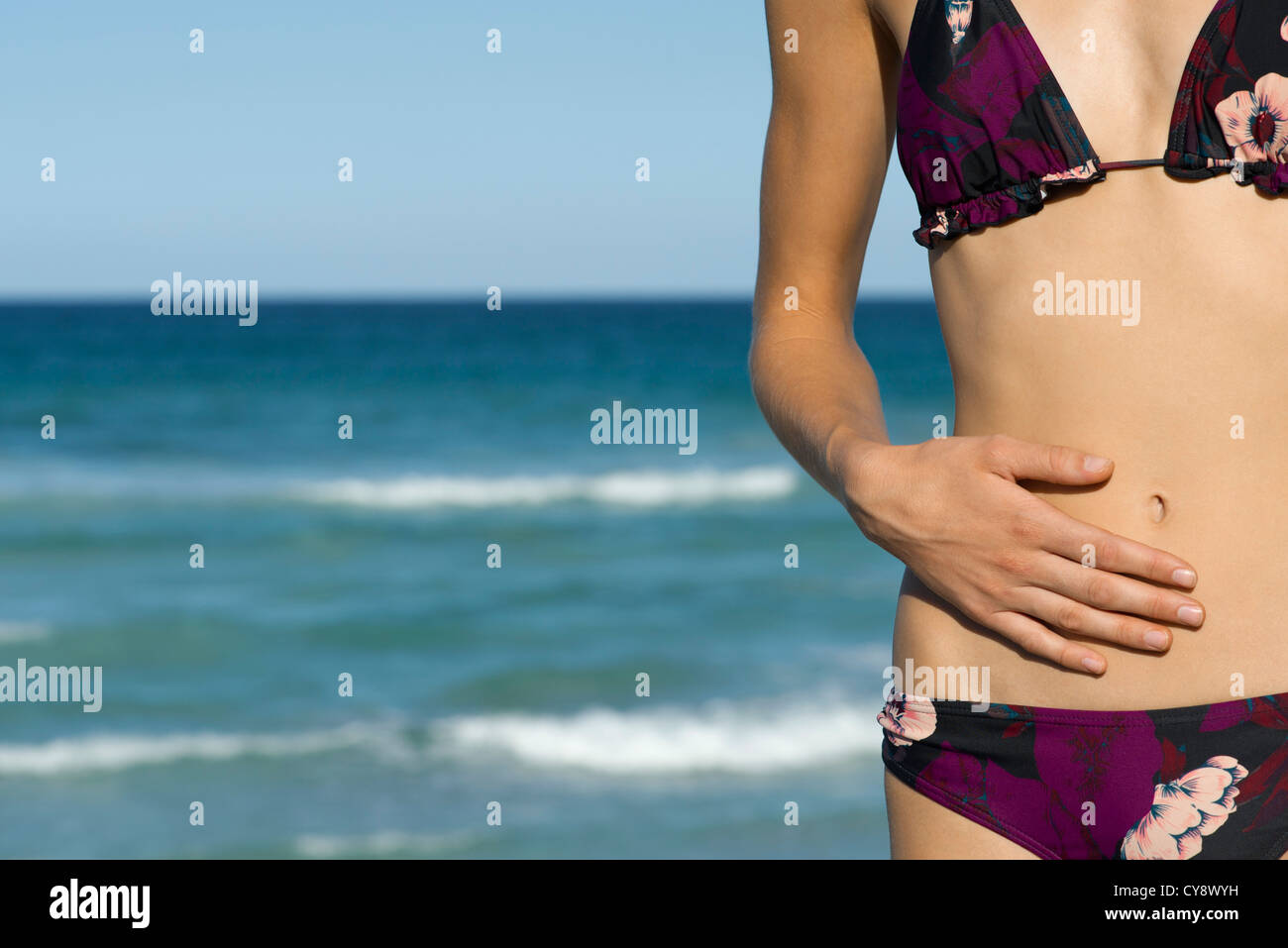 Woman in bikini, mid section Stock Photo