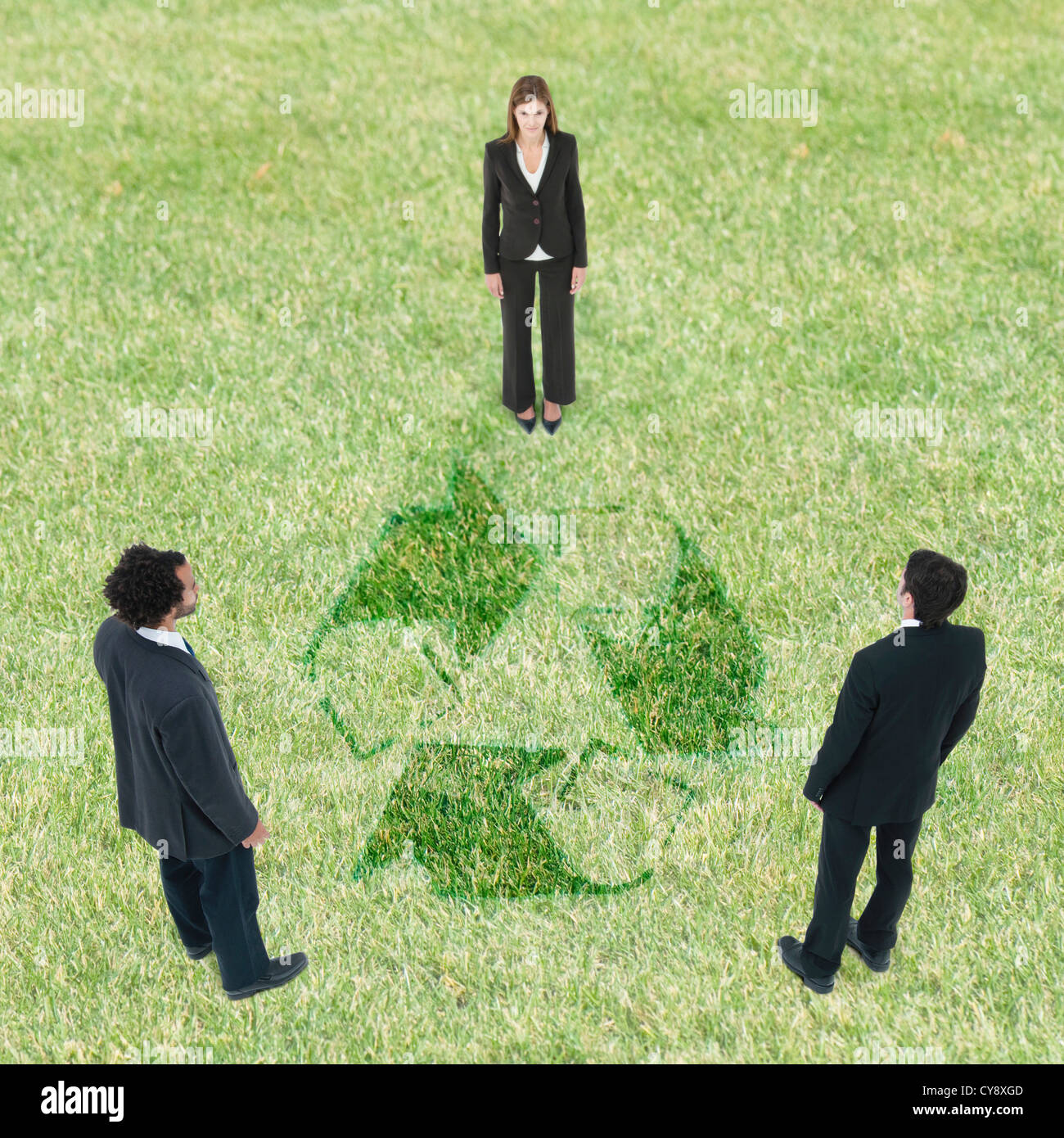 Business leaders collaborate and address environmental concerns by embracing recycling Stock Photo