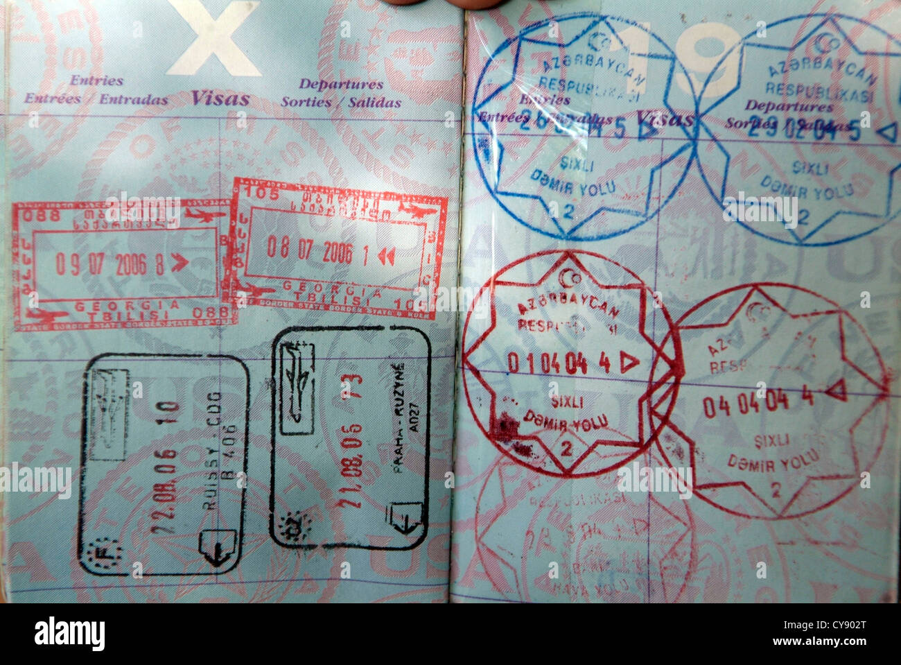 US PASSPORT open at pages showing visa stamps Stock Photo Alamy