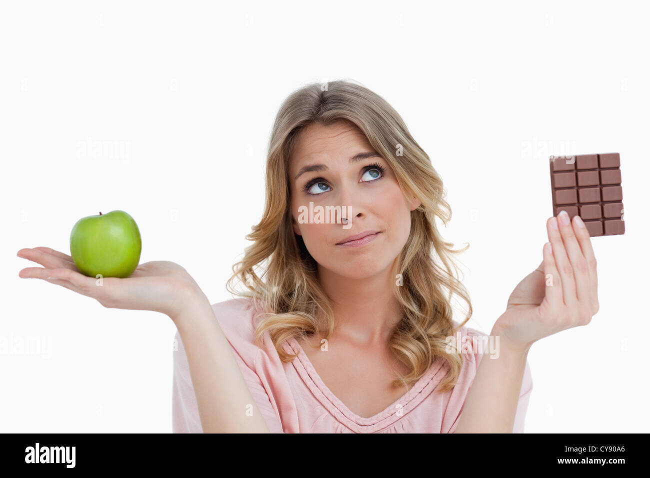 Thoughtful young woman making a decision Stock Photo