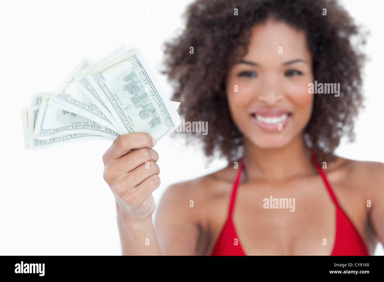 Bank notes being held by an attractive woman Stock Photo