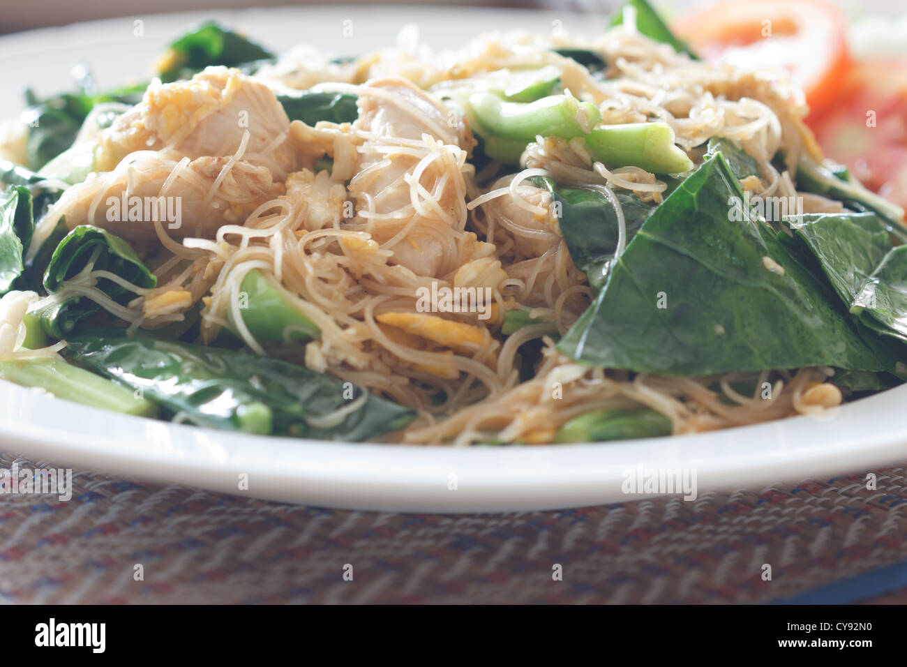 Thai noodle fried with mixed vegetable and egg, Thai style Stock Photo