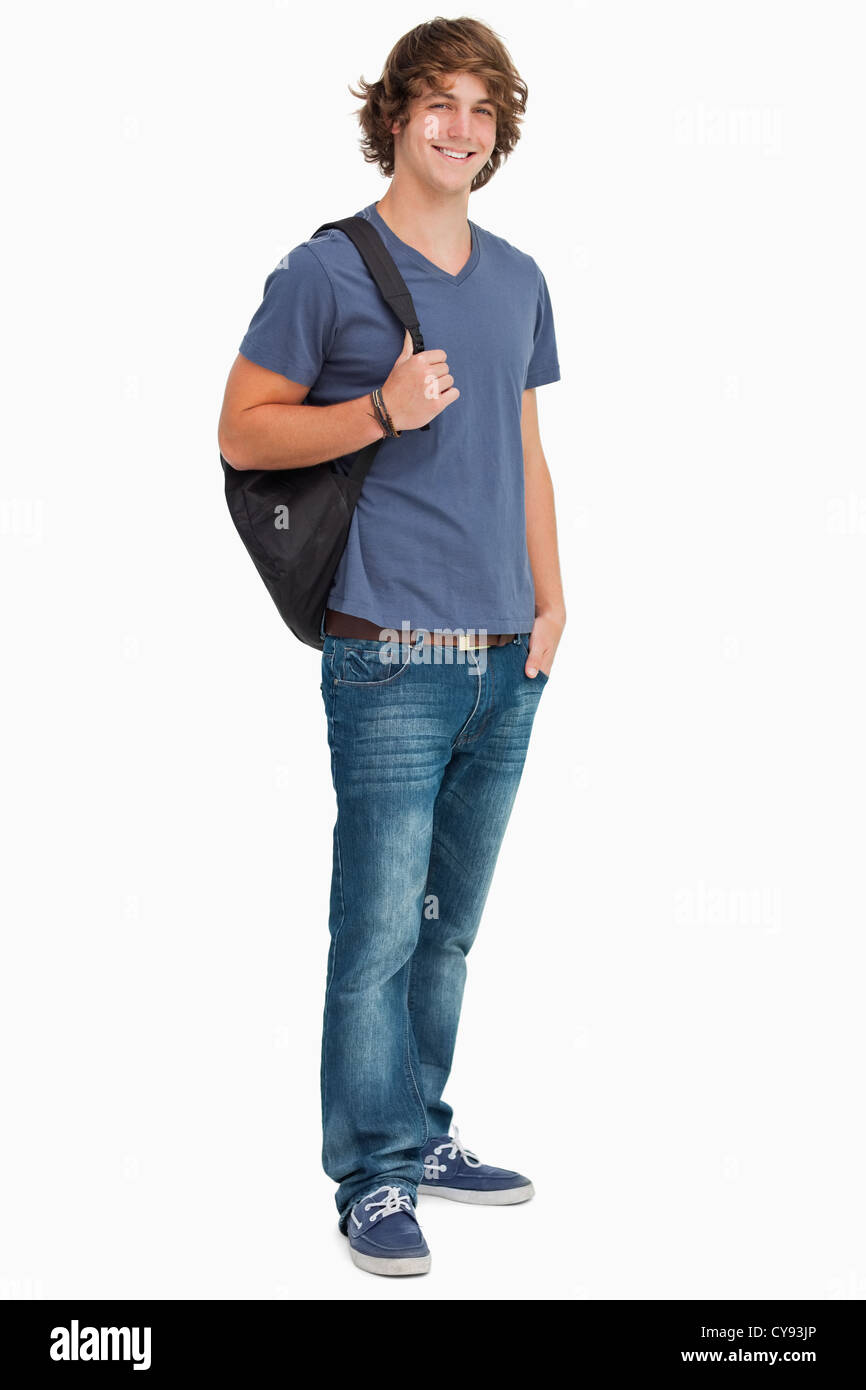 Smiling male student with a backpack Stock Photo - Alamy