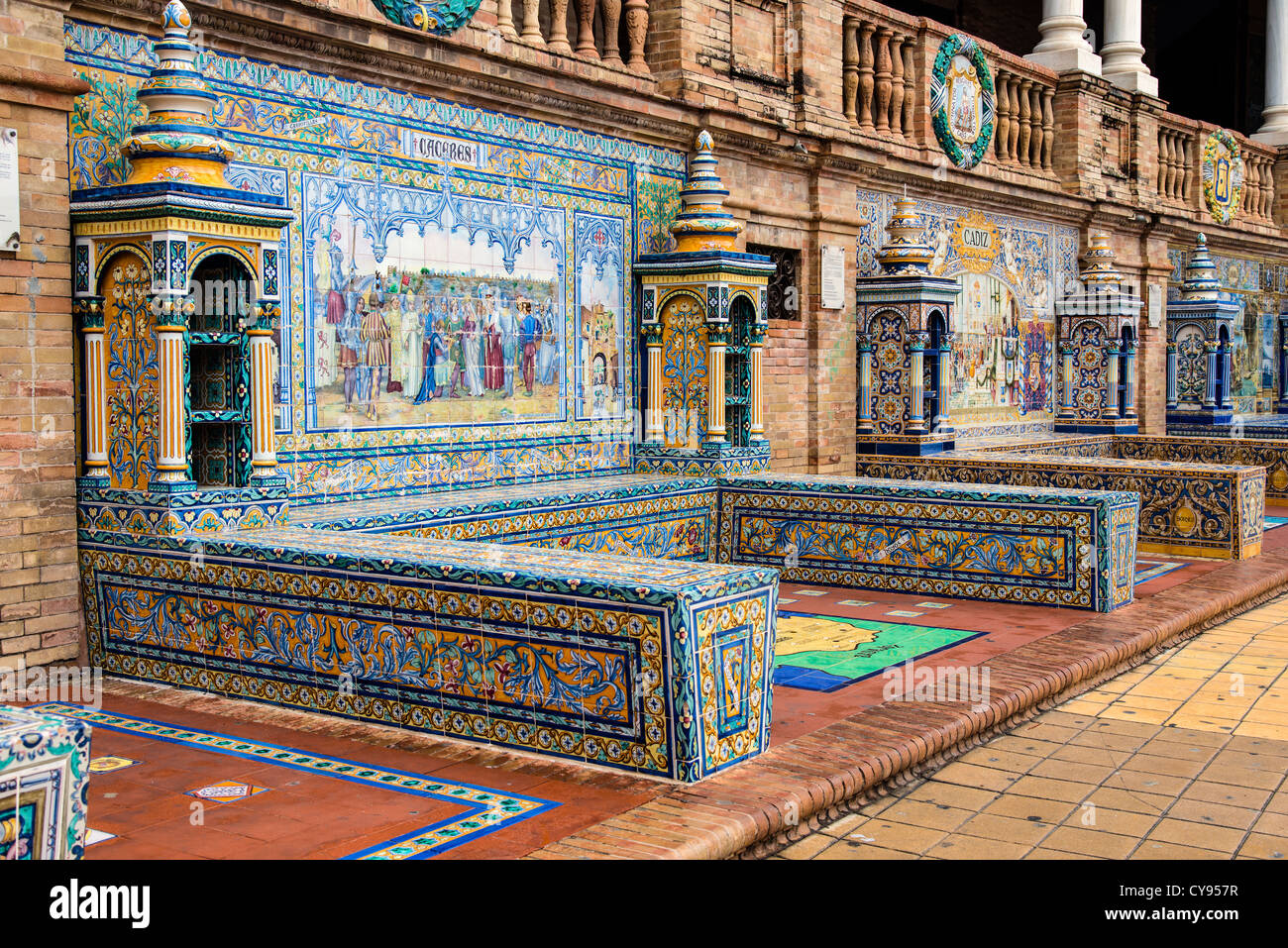 Detail of the tiled spanish provinces alcoves along the walls of the Plaza de España, Seville, Andalusia, Spain Stock Photo