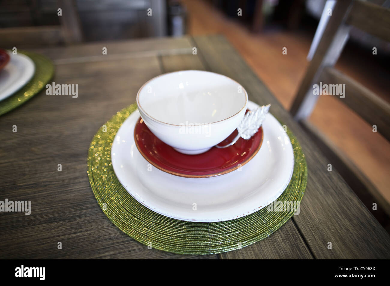 Place setting, dishes on wooden table Stock Photo