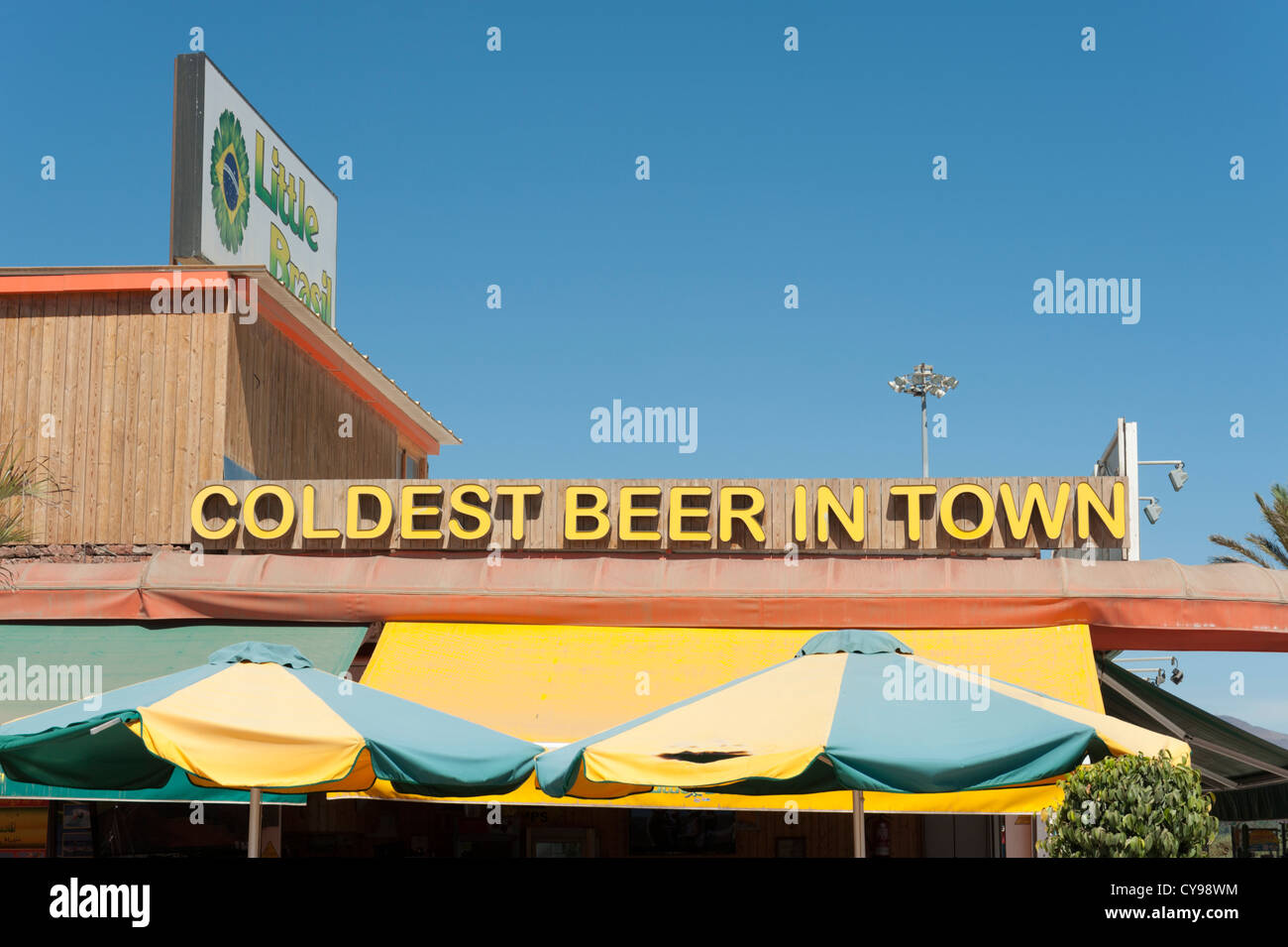 Sign on cafe coldest beer in town at Playa des Ingles Gran Canaria Canary Islands Spain Stock Photo