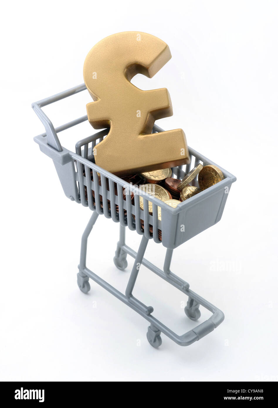 POUND SIGN AND CASH IN SHOPPING TROLLEY  RE HOUSEHOLD BILLS COSTS MORTGAGES PRICES RISING  BUDGETS INCOMES WAGES  FINANCE UK Stock Photo