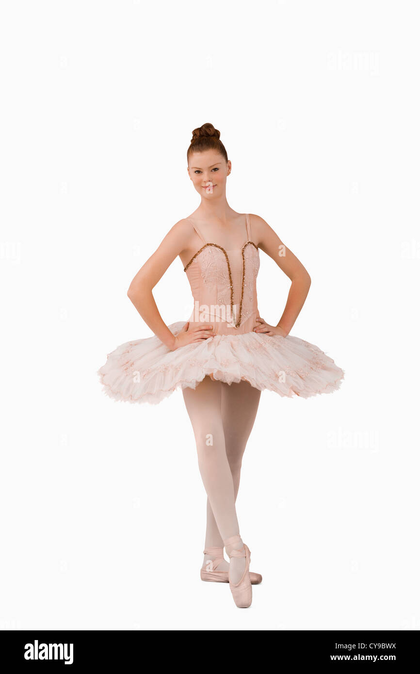 Posing ballerina with leg forward Stock Photo