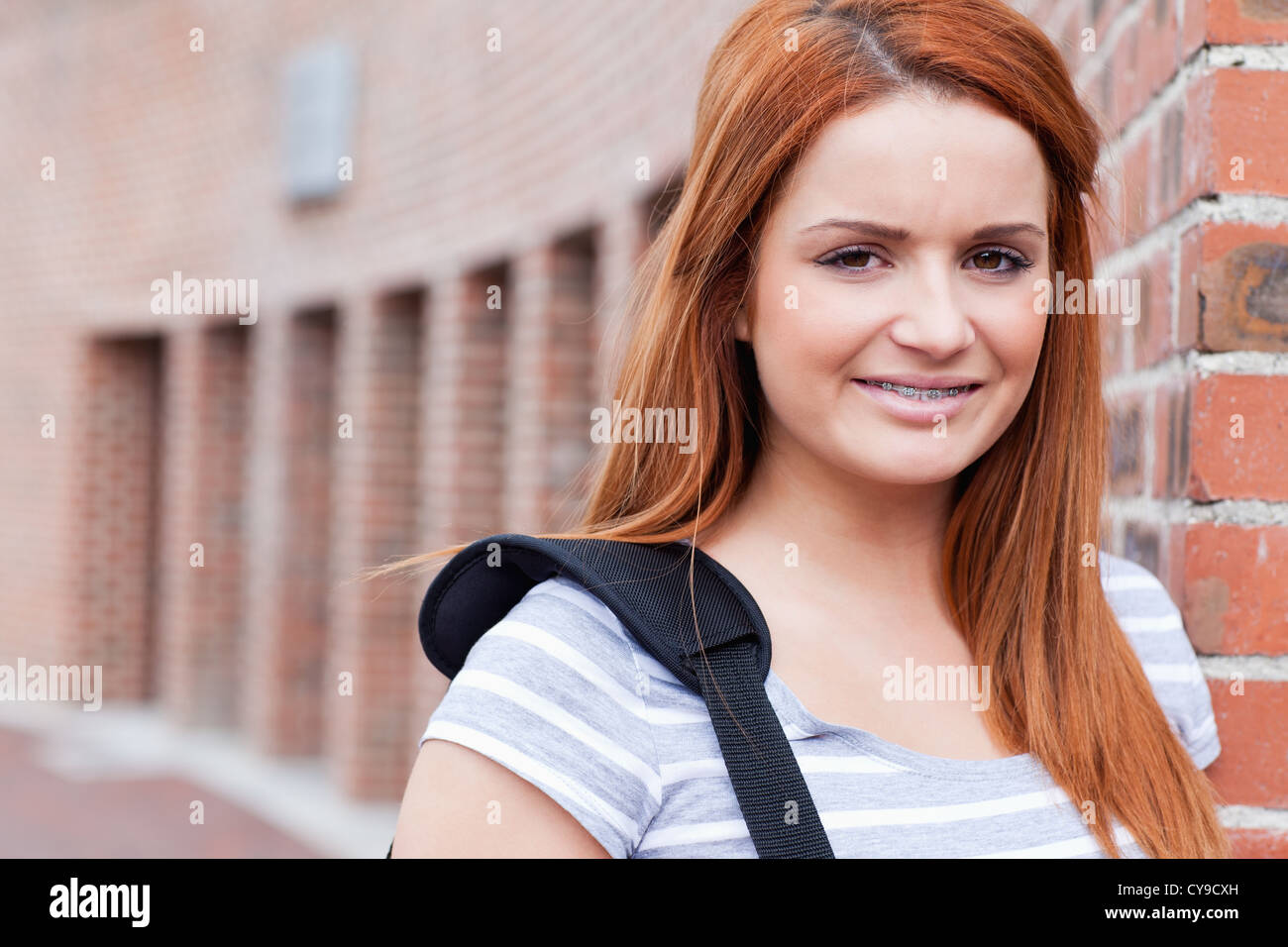 Smiling student looking at the camera Stock Photo - Alamy
