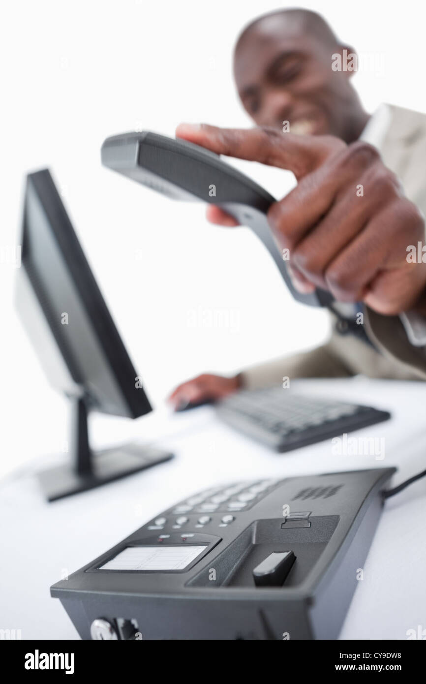 Portrait of an angry salesman hanging up Stock Photo Alamy