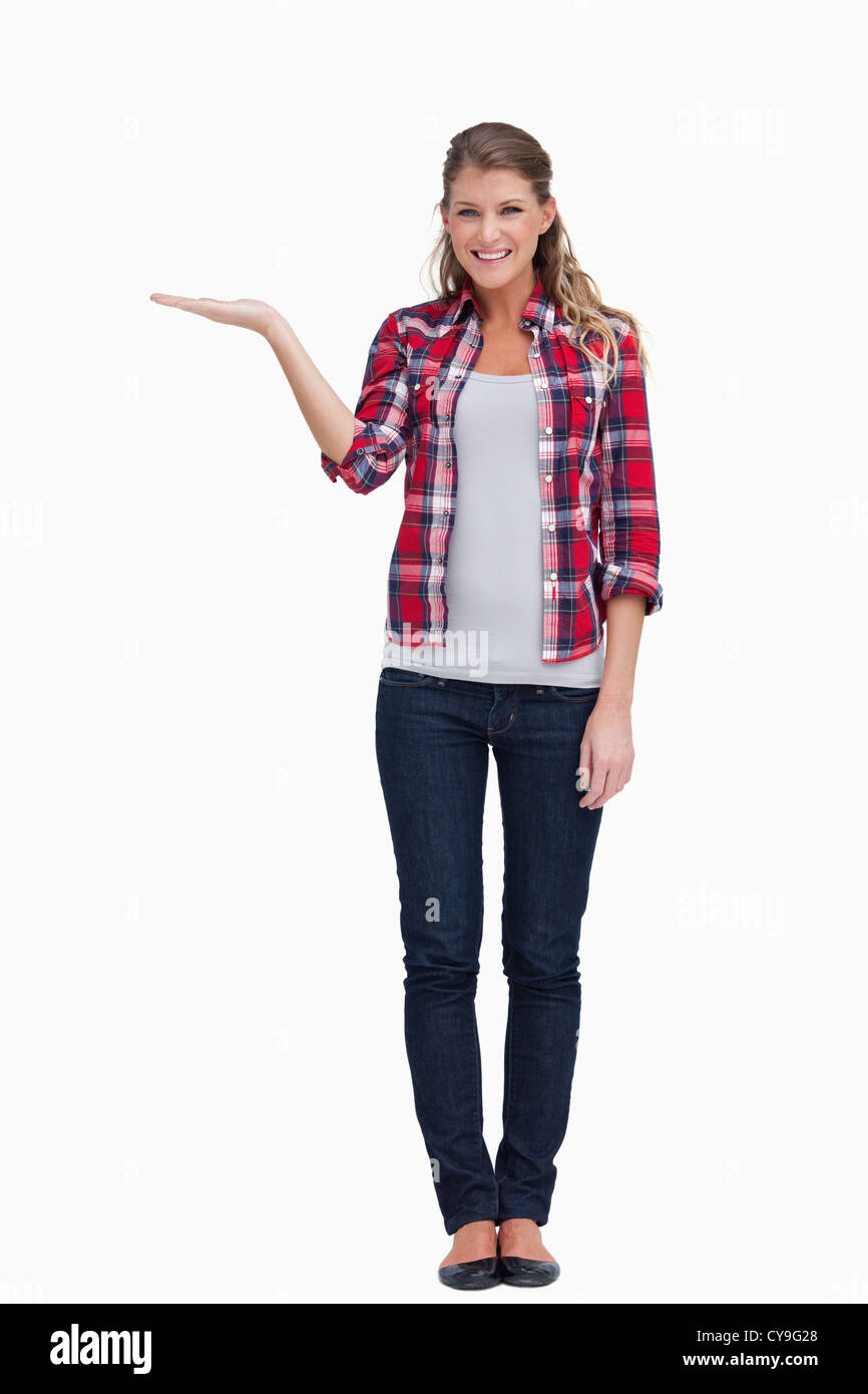 Portrait of a woman displaying a copy space Stock Photo - Alamy