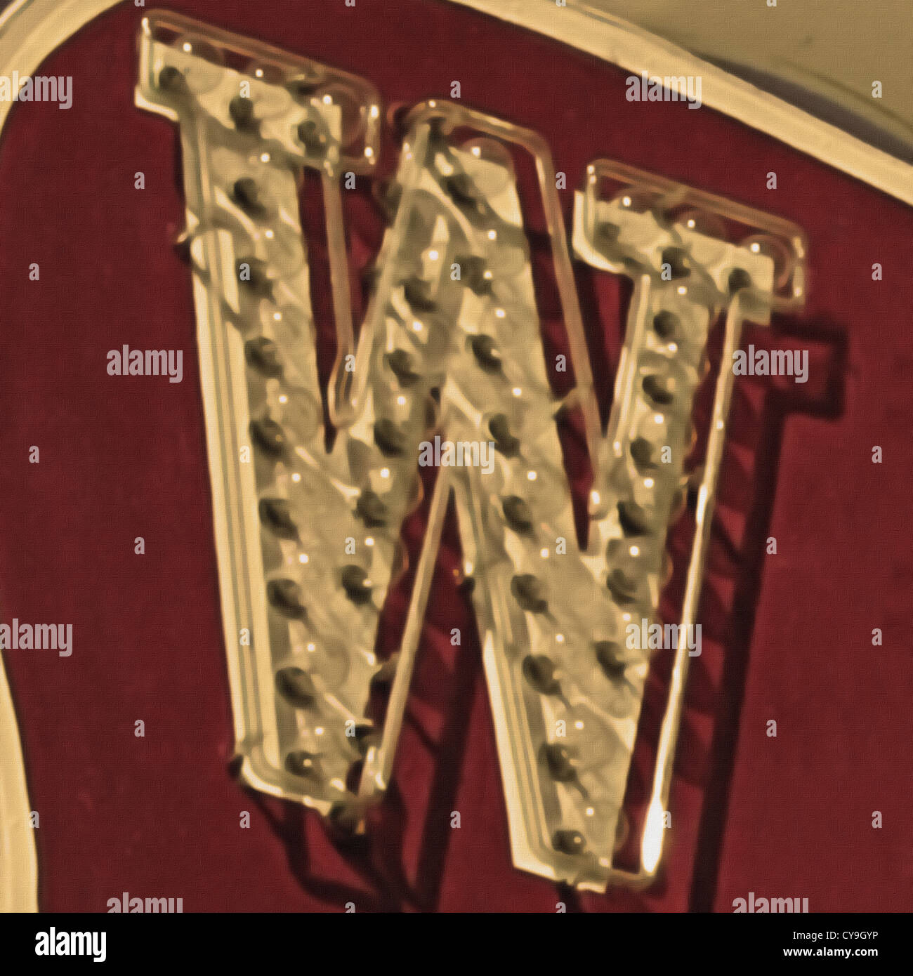 Painting of the letter W in neon with canvas texture. Stock Photo