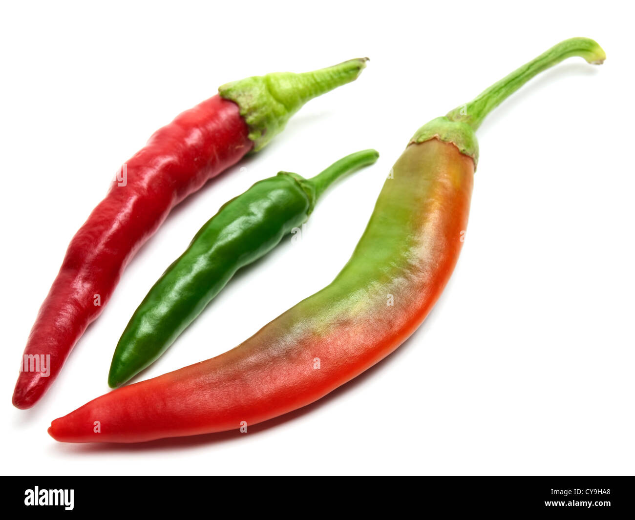Three various hot peppers on a white background Stock Photo - Alamy
