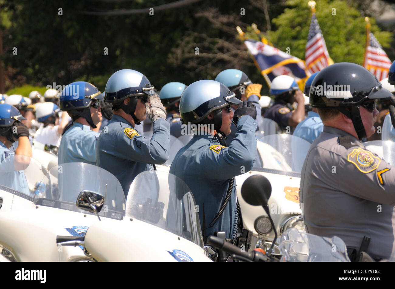 Police salute at a policeman's funeral in Beltsville, Maryland Stock Photo