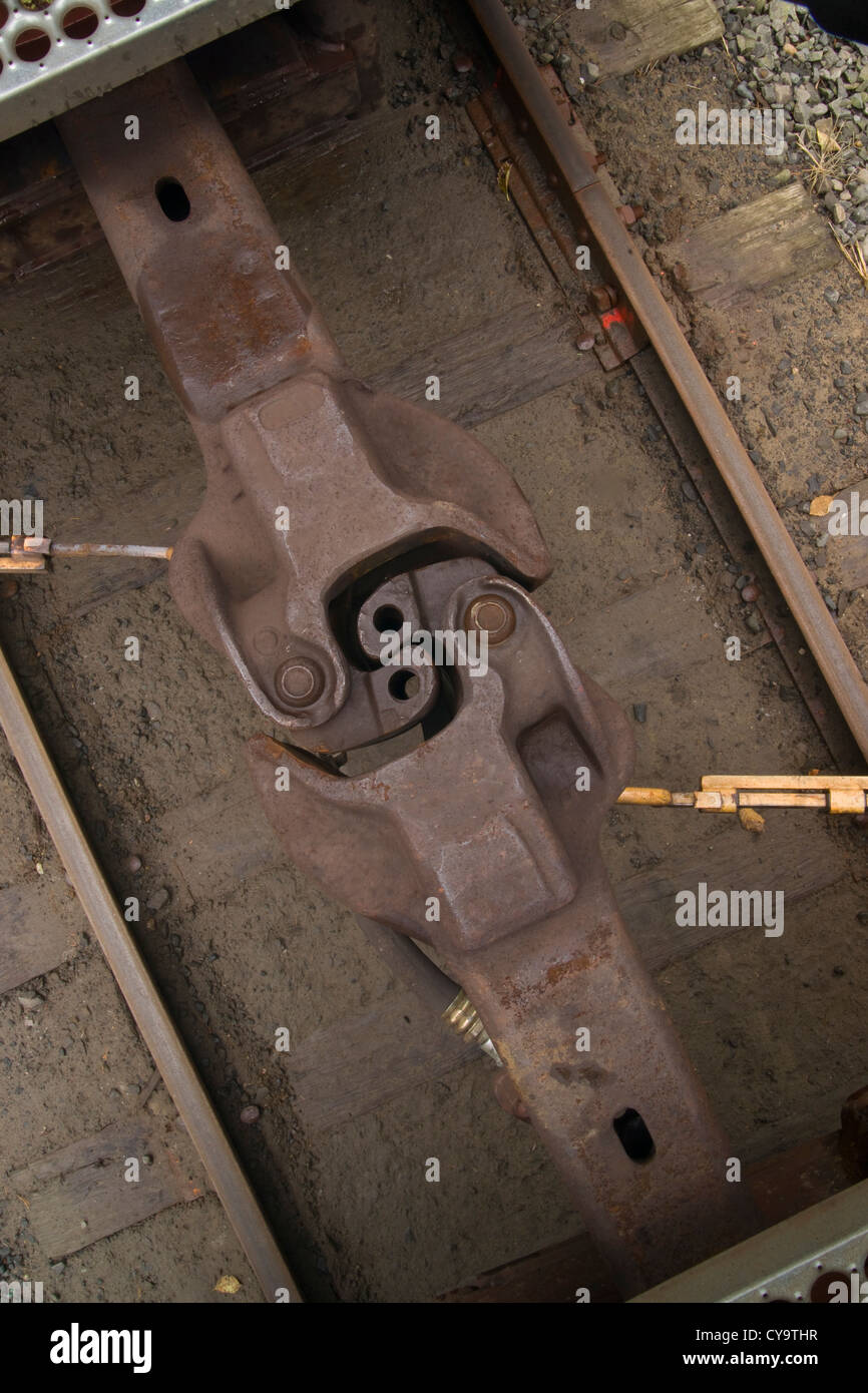 A coupling holds two railroad cars together Stock Photo