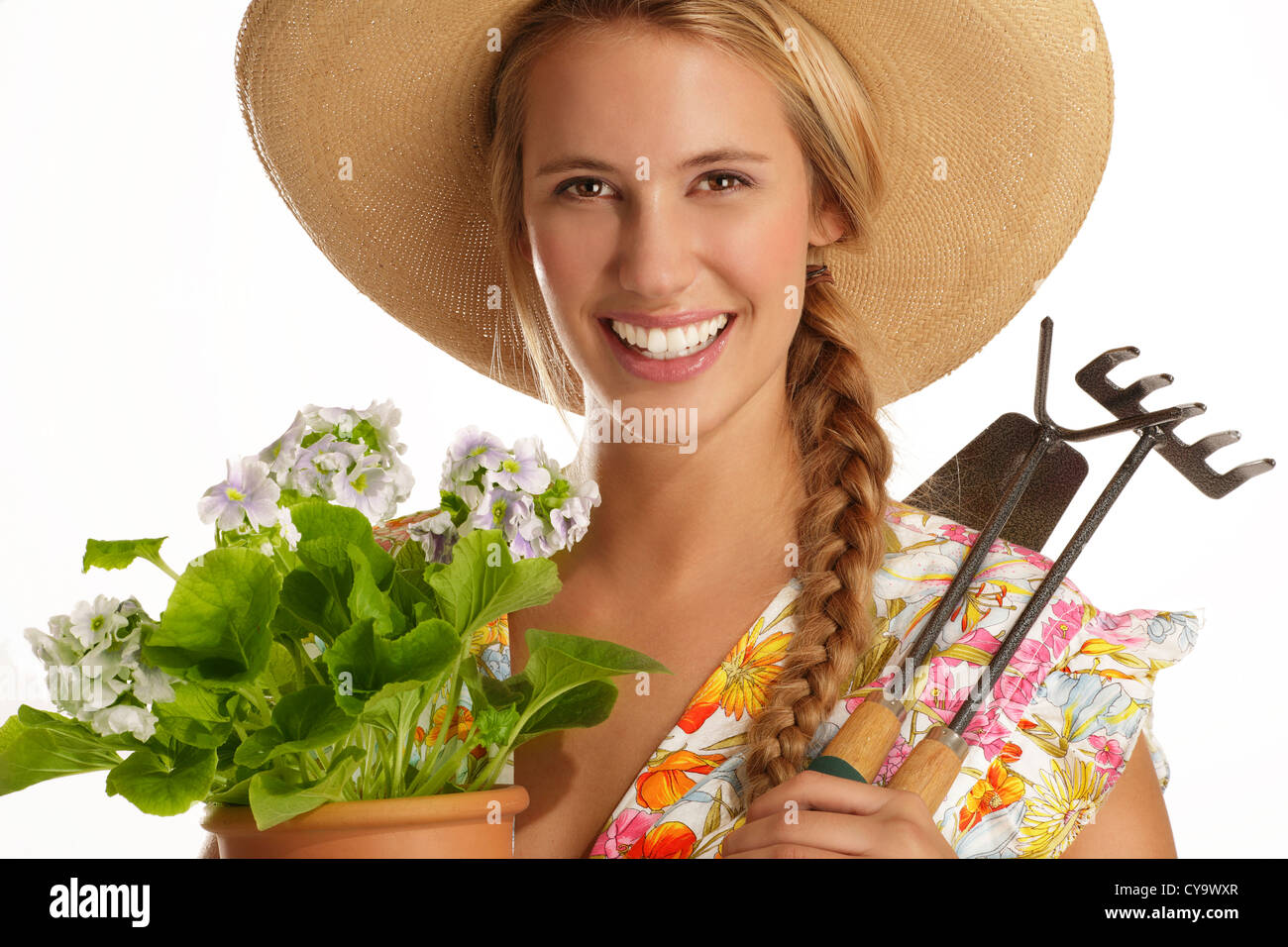 young woman gardener on white background Stock Photo - Alamy