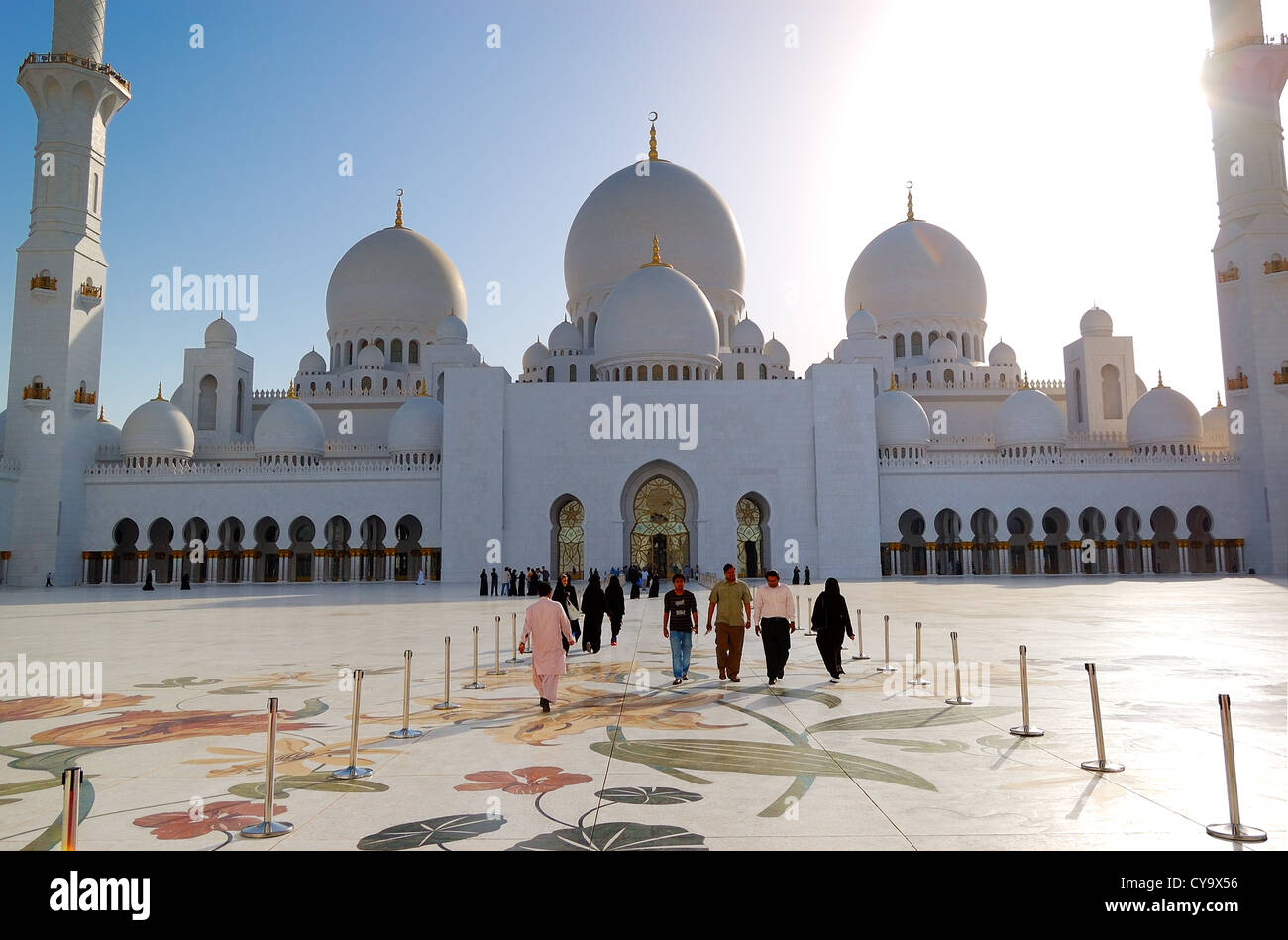 The Sheikh Zayed Grand Mosque, muslims and tourists, Abu Dhabi, UAE Stock Photo