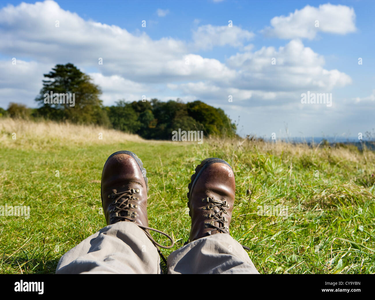 Person laying in hiking boots. Stock Photo