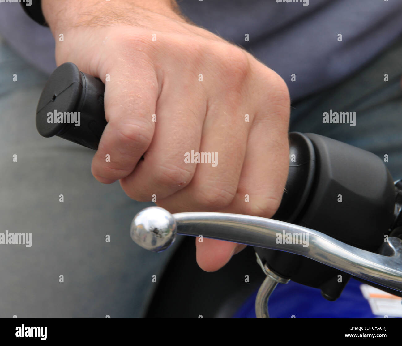 Hand on handle of the gas Stock Photo Alamy