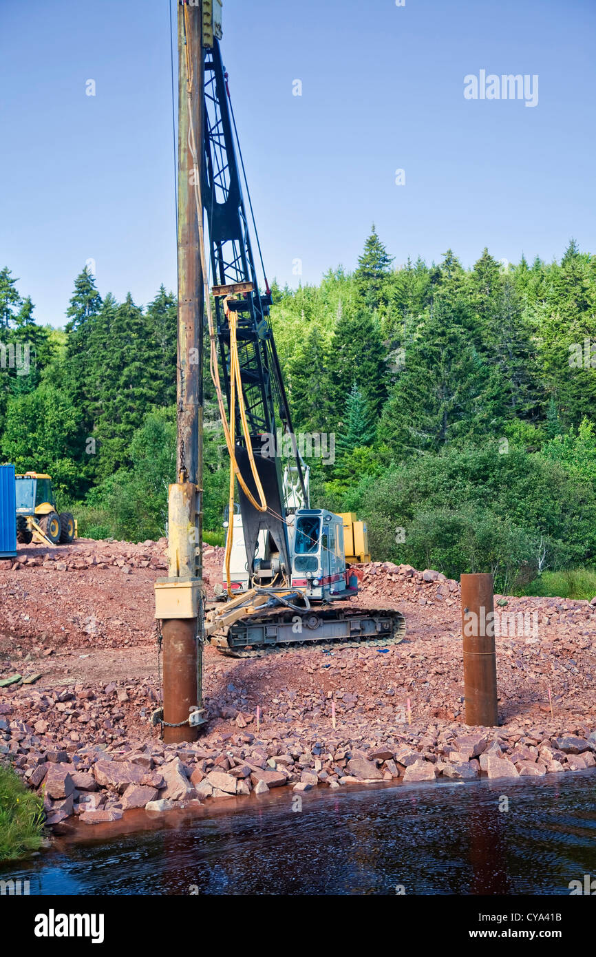 Construction of a bridge over a rural river Stock Photo Alamy
