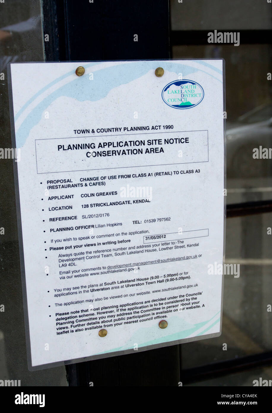 Planning Application site notice Conservation Area sign in shop window
