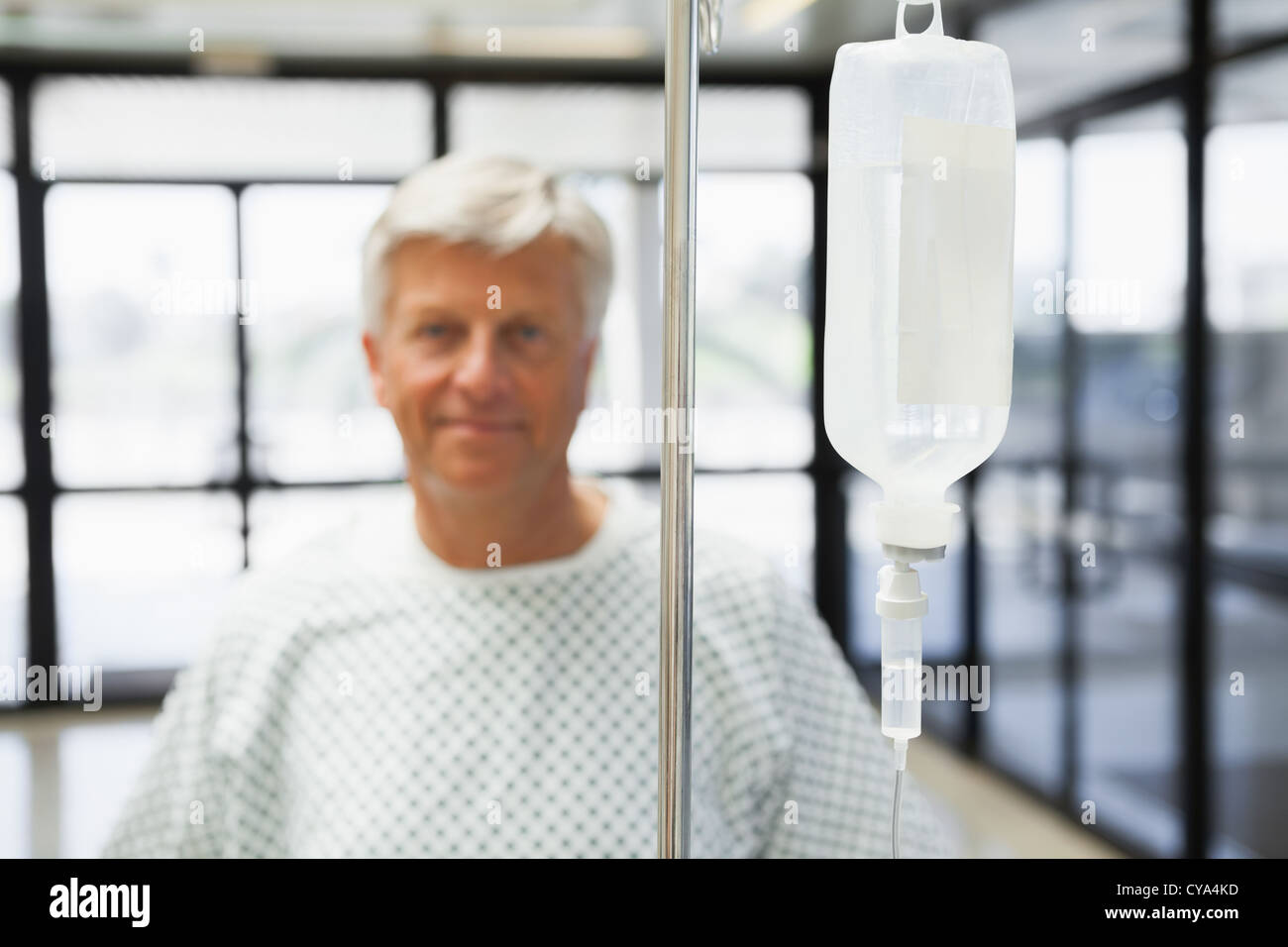 Patient with IV drip smiling Stock Photo