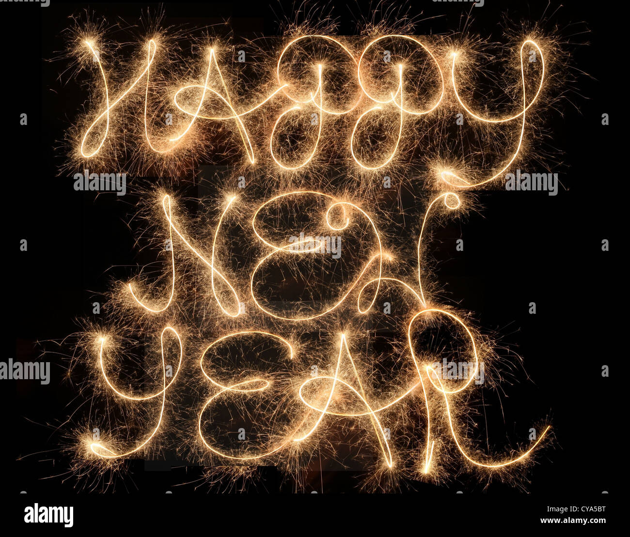 Happy New Year, written with sparklers Stock Photo