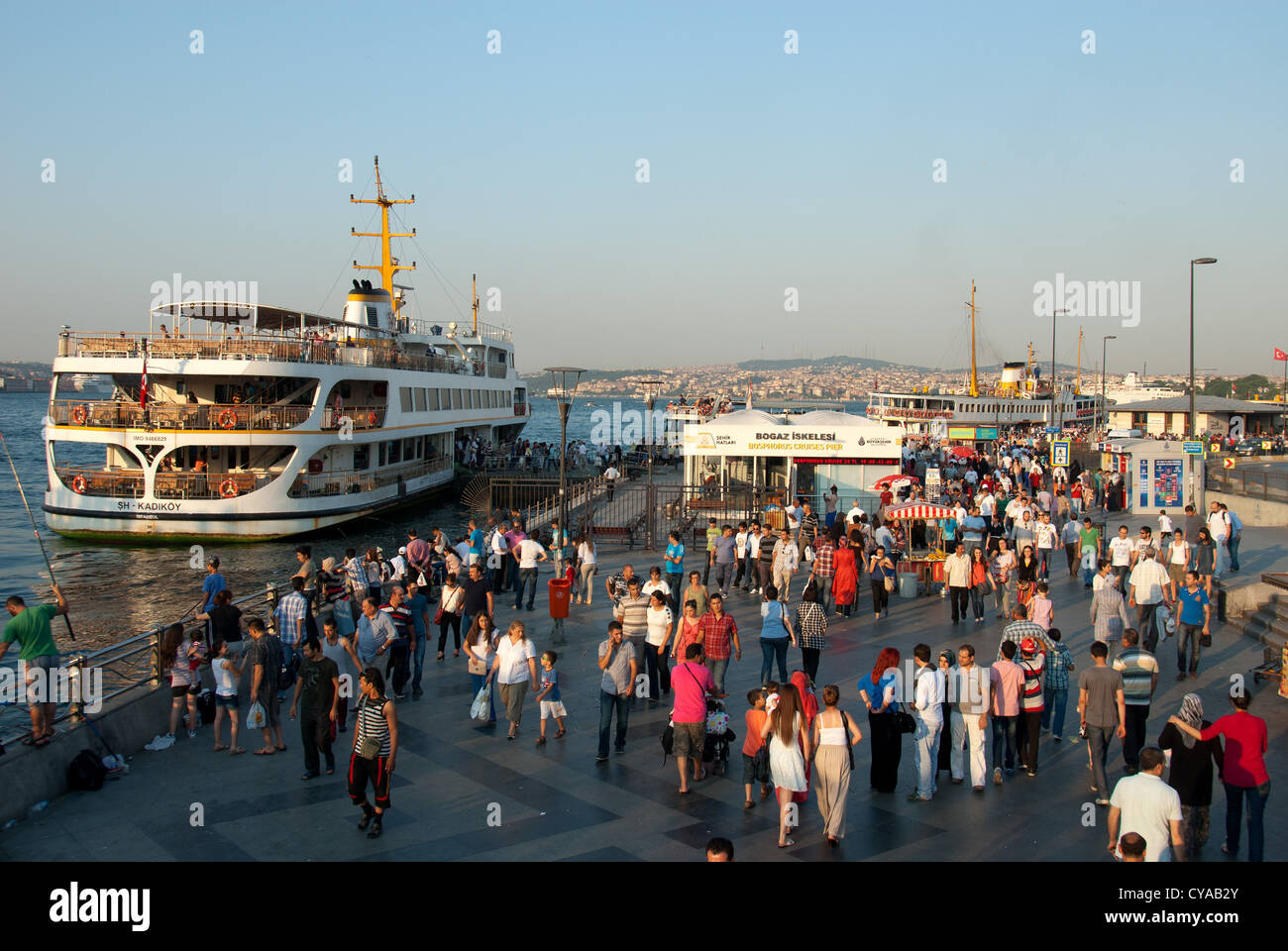 ISTANBUL, TURKEY. The busy waterfront at Eminonu ferry terminal on the Golden Horn. 2012. Stock Photo
