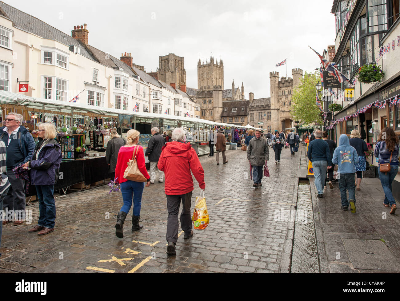 WELLS, UK - a street market in the Market Place in the center of Wells, Somerset, near Wells Cathedral (visible in the background). Stock Photo