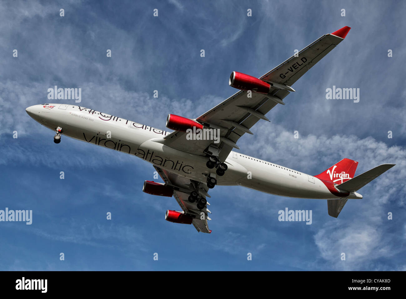 An Airbus A340 of Virgin Atlantic Airways on final approach Stock Photo