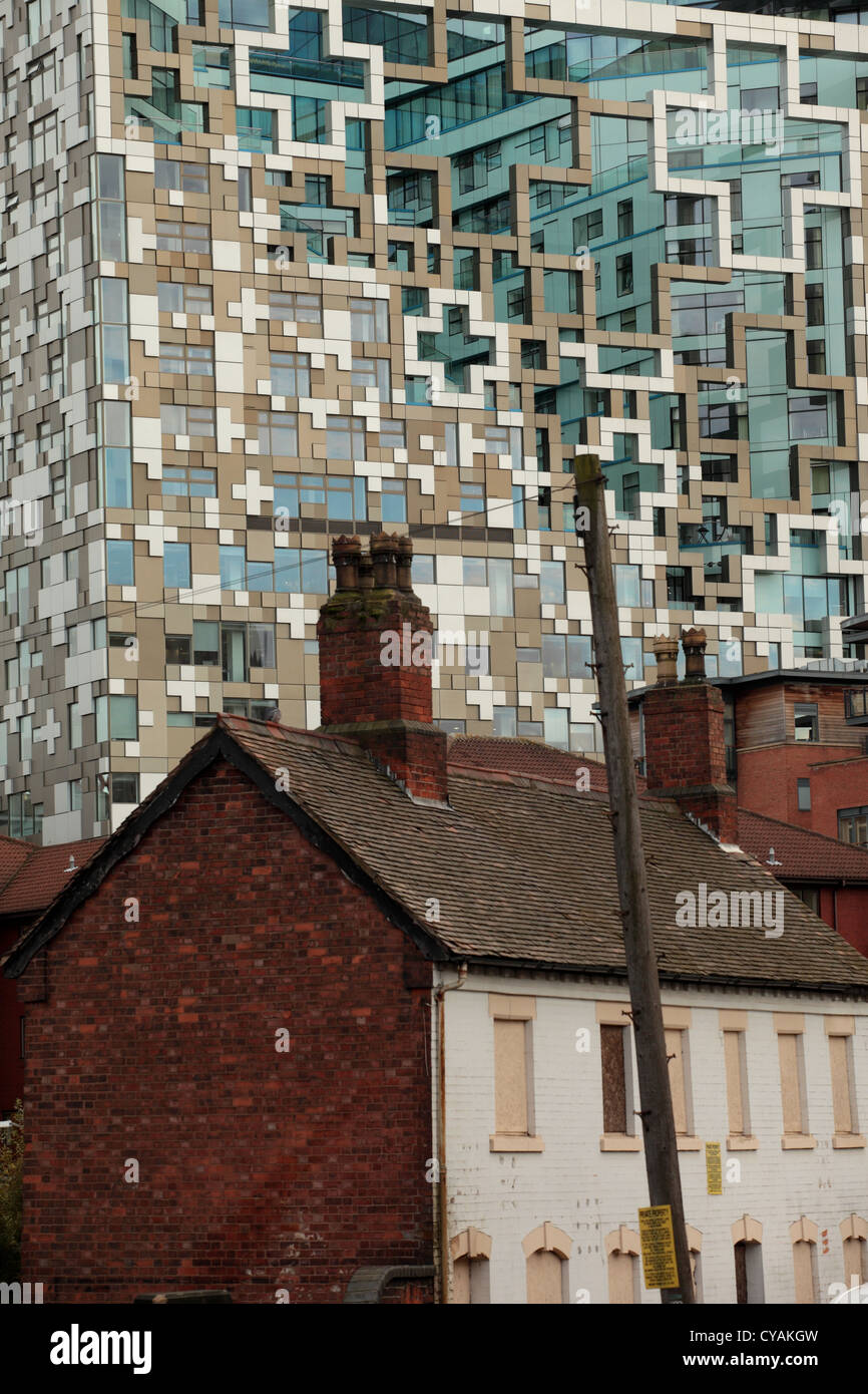 Old buildings overshadowed by newer twentieth century architecture in