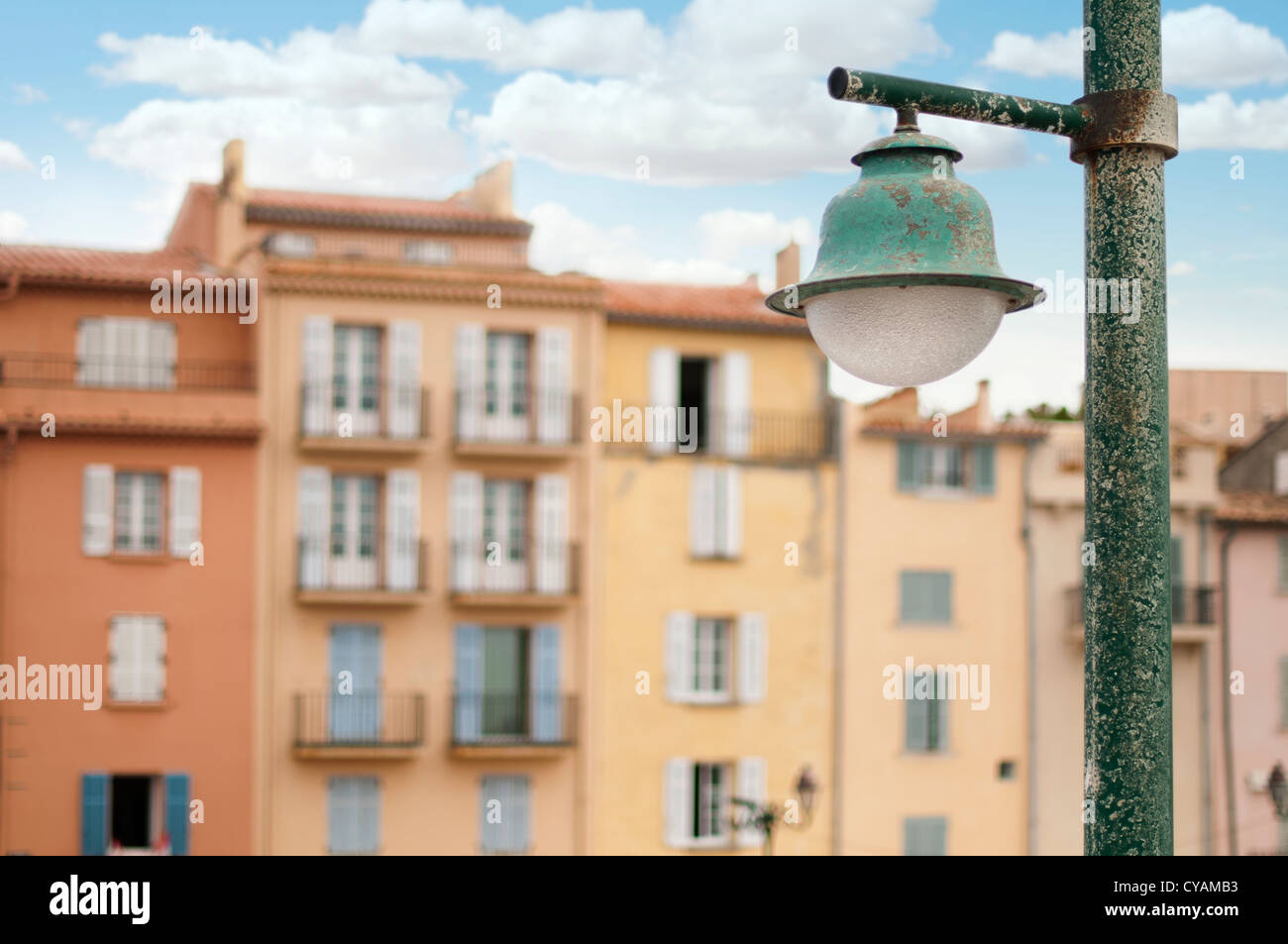 Ancient buildings in St. Tropez. Old street lamp Stock Photo