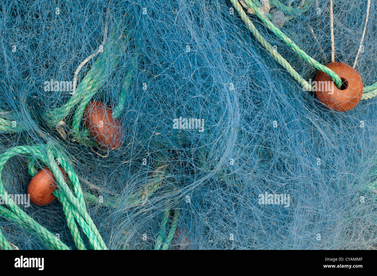 https://c8.alamy.com/comp/CYAMMF/blue-color-fishing-nets-background-CYAMMF.jpg