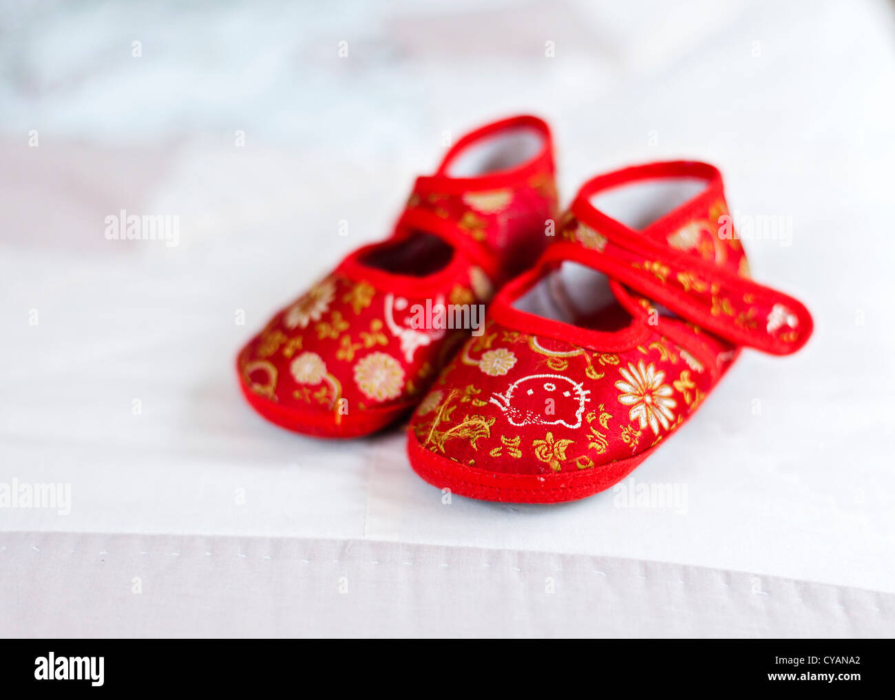 red baby slippers