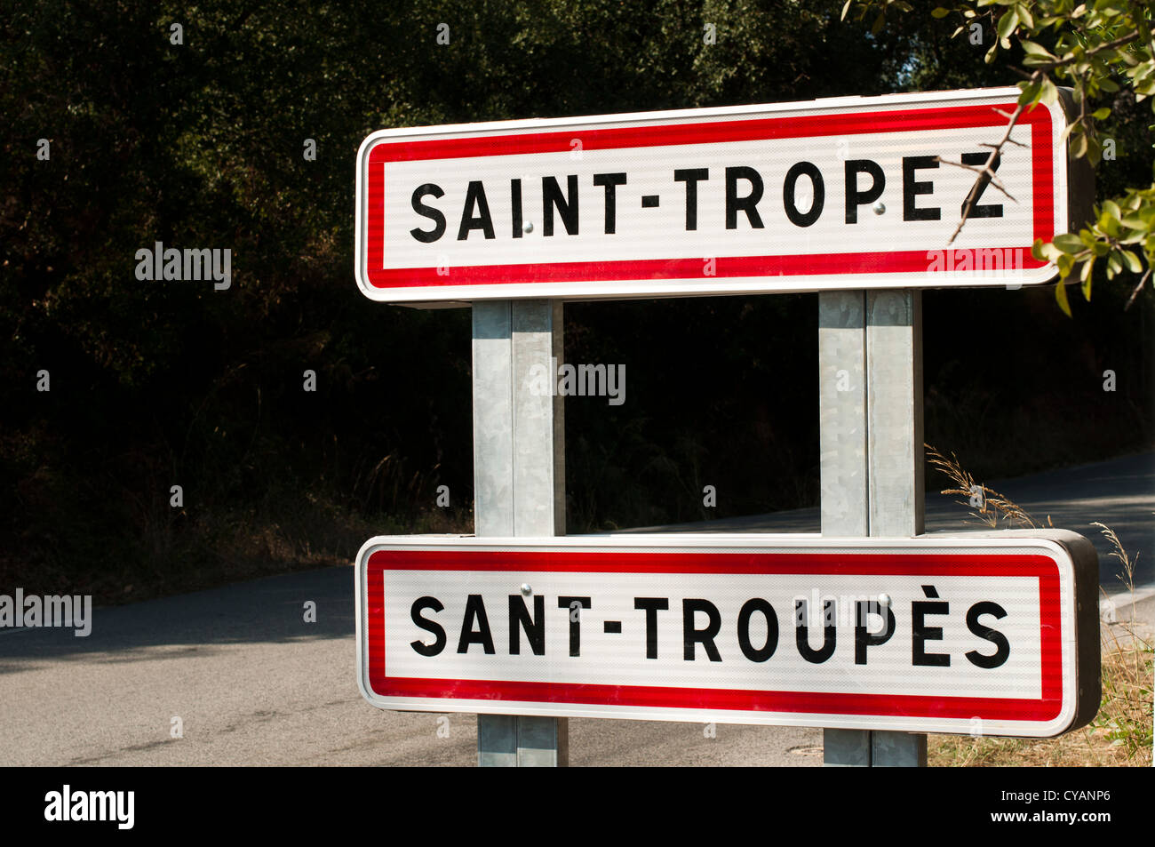St. Tropez road sign and trees on background Stock Photo
