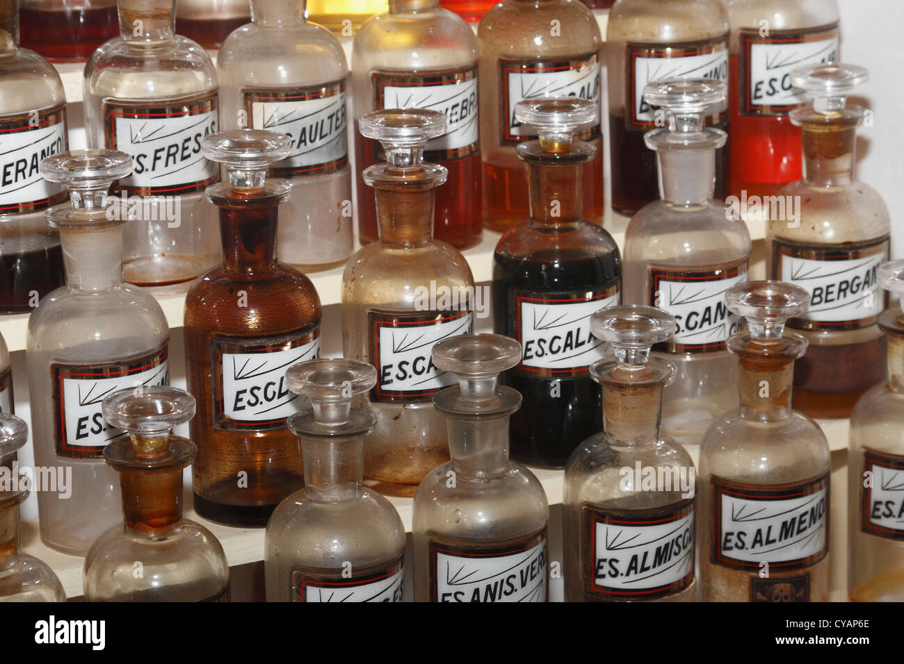 Vintage medical pharmaceutical colorful chemical bottles on the shelf