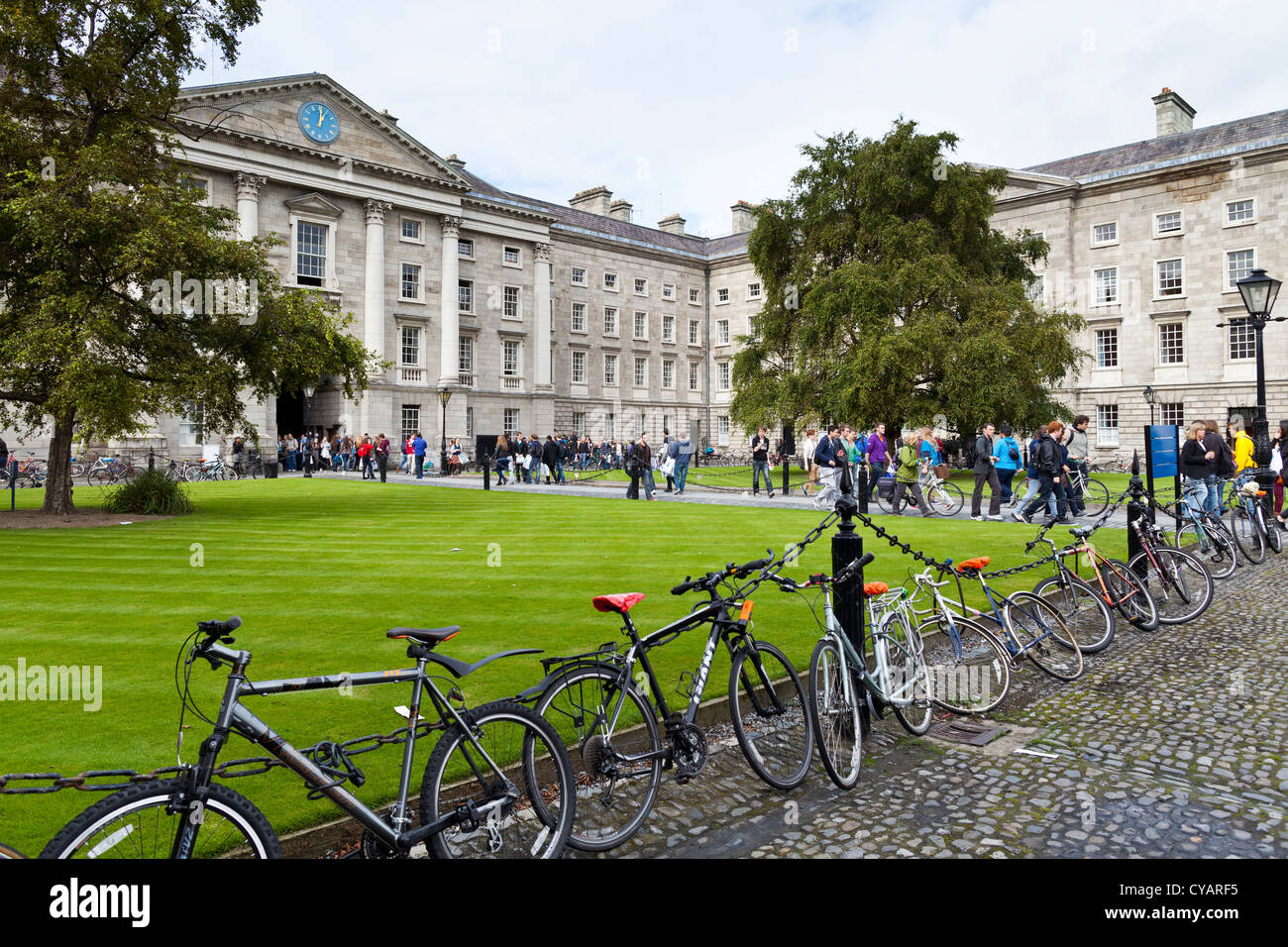 Students walking through Trinity College grounds, Dublin, Ireland Stock